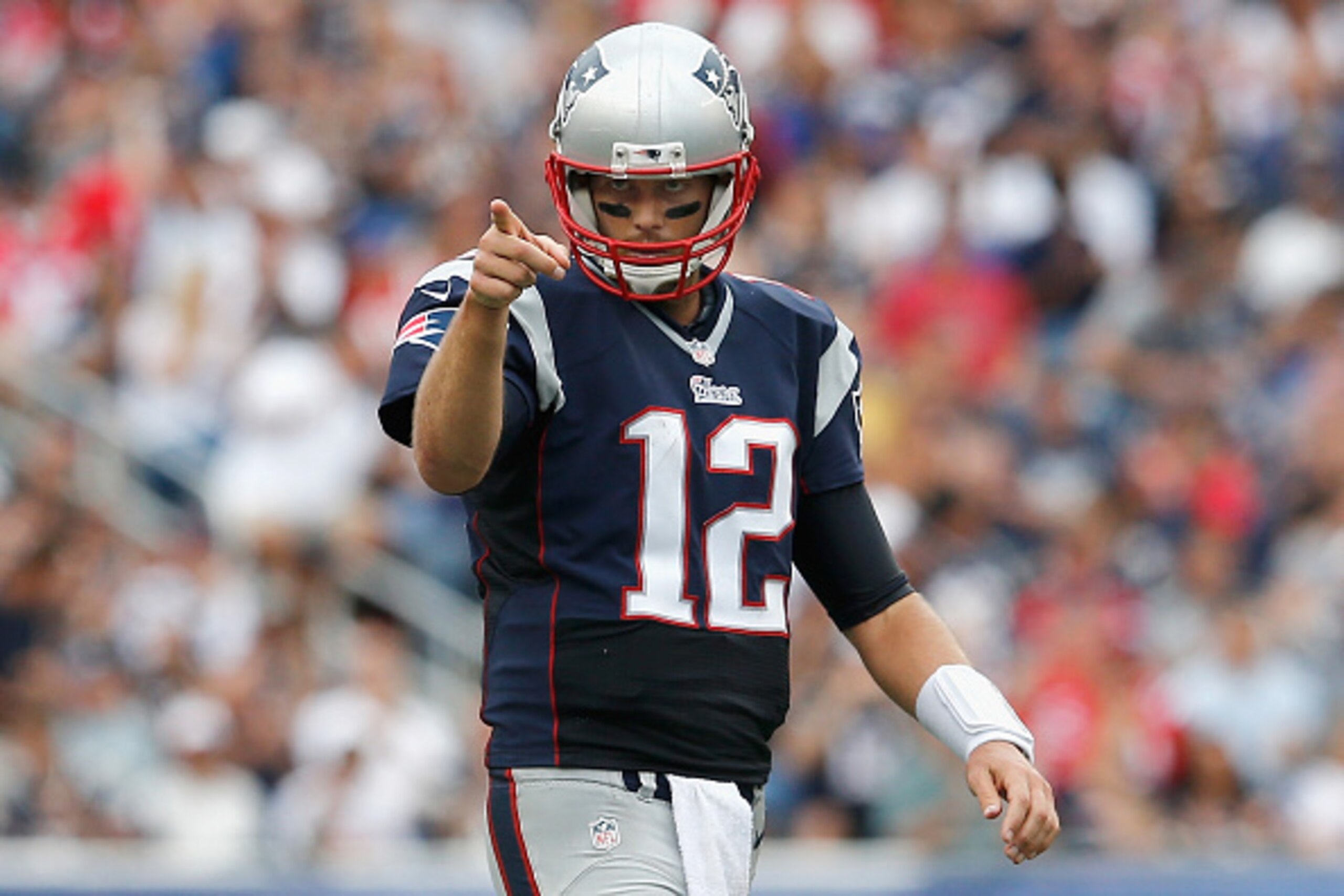 FOXBORO, MA - SEPTEMBER 21:  Tom Brady #12 of the New England Patriots gestures during the third quarter against the Oakland Raiders at Gillette Stadium on September 21, 2014 in Foxboro, Massachusetts.  (Photo by Jim Rogash/Getty Images)