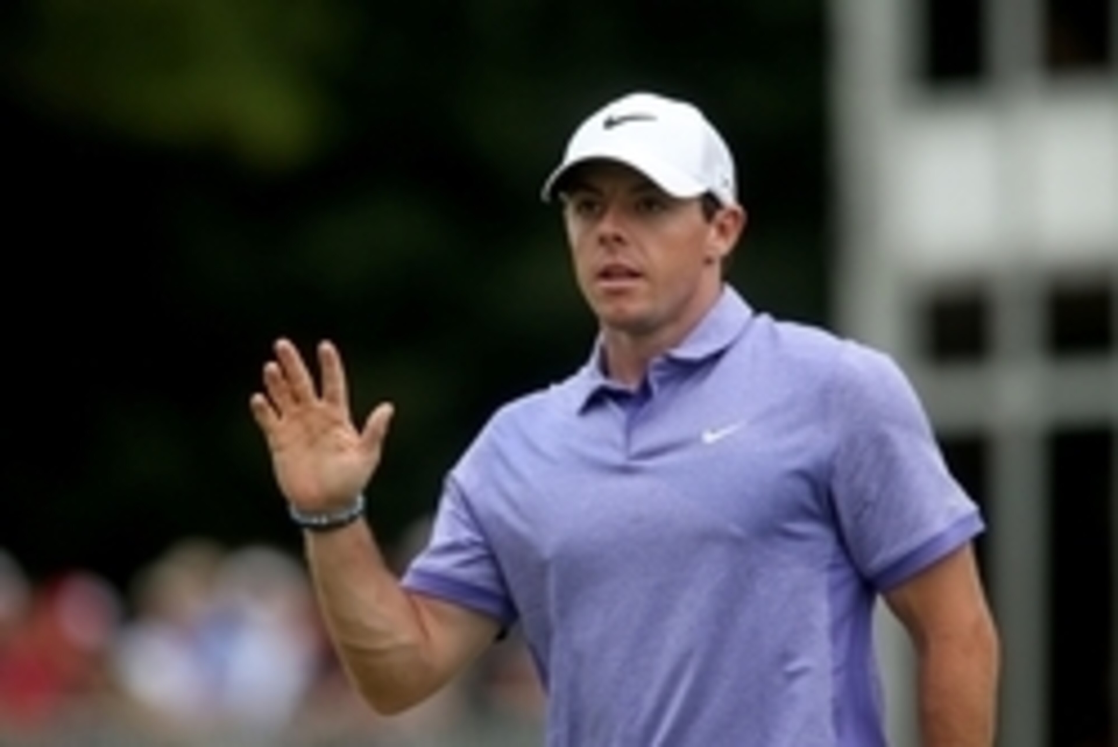 Sep 14, 2014; Atlanta, GA, USA; Rory McIlroy reacts to the crowd after his putt on the sixteenth green during the final round of the Tour Championship at East Lake Golf Club. Mandatory Credit: Jason Getz-USA TODAY Sports