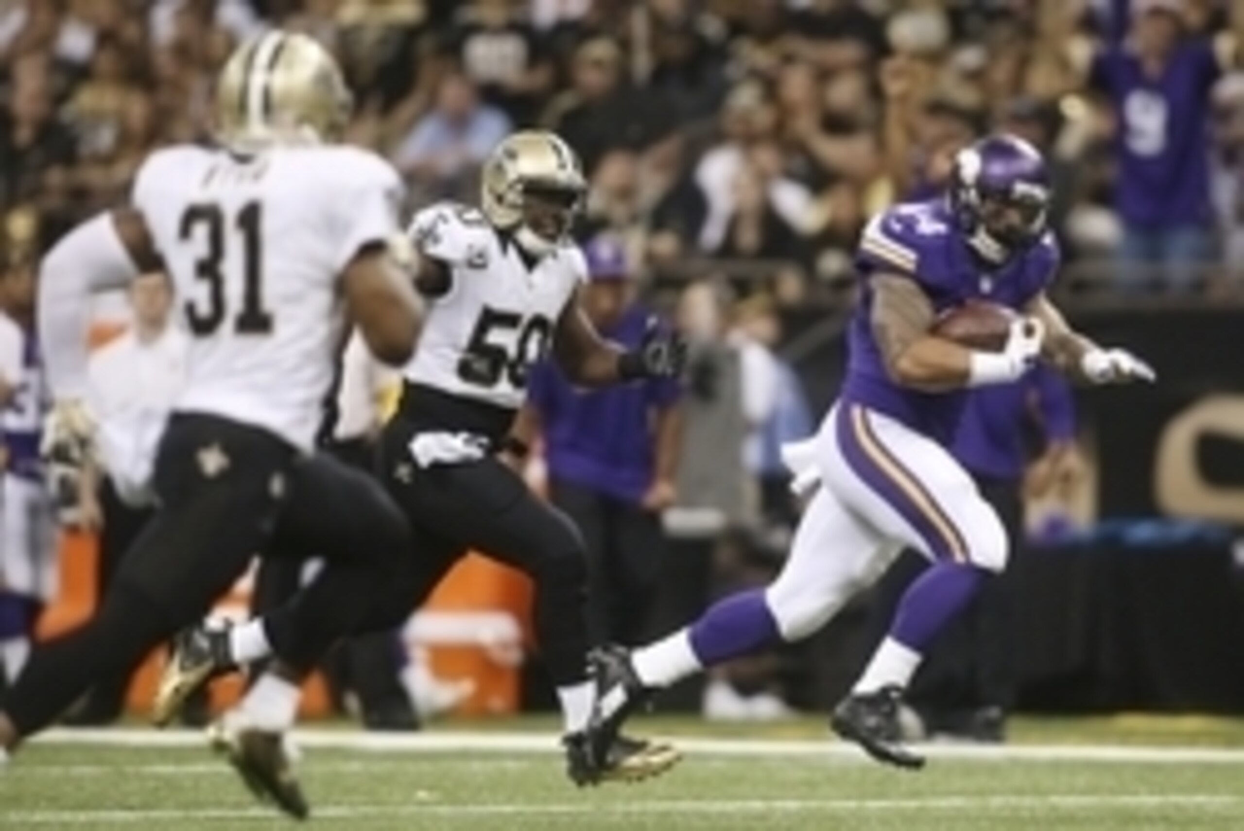 Sep 21, 2014; New Orleans, LA, USA; Minnesota Vikings running back Matt Asiata (44) carries the ball in front of New Orleans Saints middle linebacker Curtis Lofton (50) in the first half at Mercedes-Benz Superdome. Mandatory Credit: Crystal LoGiudice-USA 