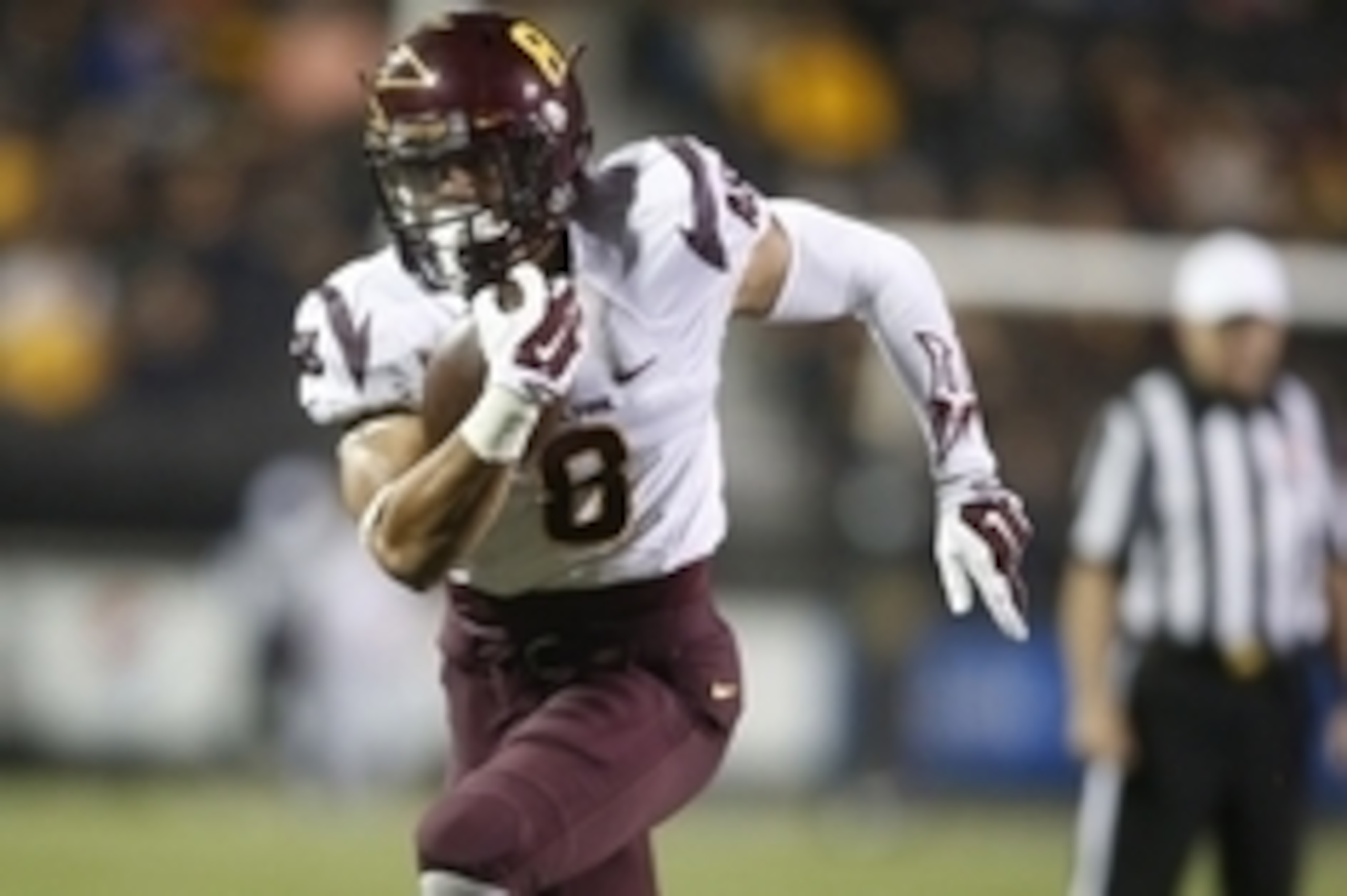 Sep 13, 2014; Boulder, CO, USA; Arizona State Sun Devils running back D.J. Foster (8) runs with the ball for a touchdown during the first half against the Colorado Buffaloes  at Folsom Field . Mandatory Credit: Chris Humphreys-USA TODAY Sports