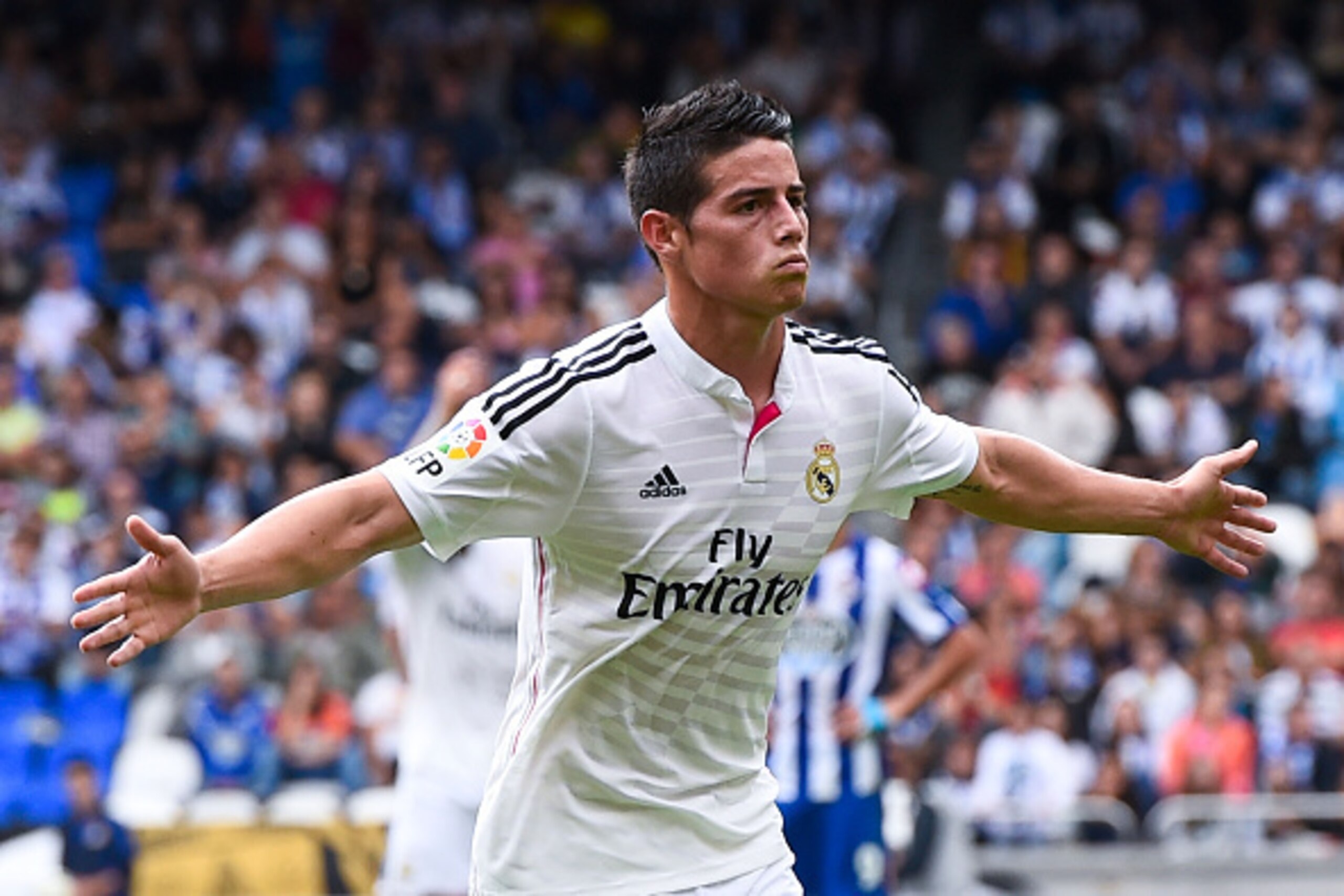 LA CORUNA, SPAIN - SEPTEMBER 20:  James Rodriguez of Real Madrid CF celebrates after scoring his team's second goal during the La Liga match between RC Deportivo La Coruna and Real Madrid CF at Riazor Stadium on September 20, 2014 in La Coruna, Spain.  (P