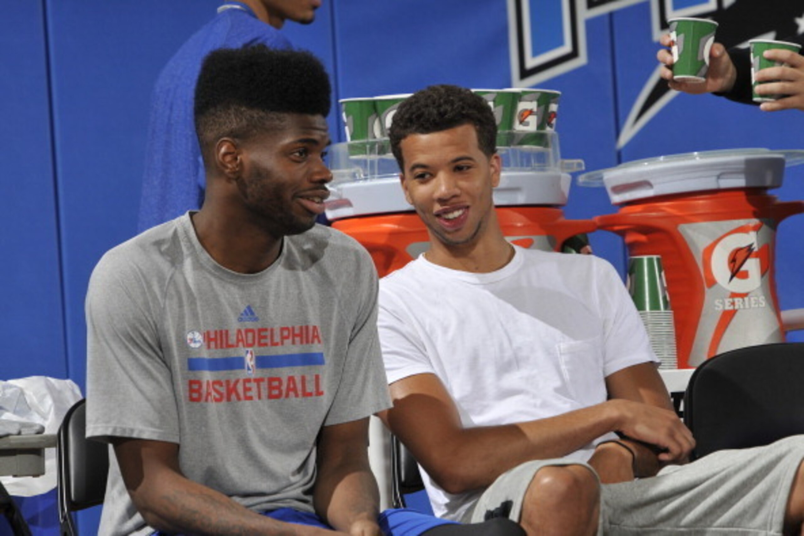 ORLANDO, FL - JULY 11: Nerlens Noel #4 and Michael Carter-Williams #1 of the Philadelphia 76ers sit on the sideline during a game against the Memphis Grizzlies during the Samsung NBA Summer League 2014 on July 11, 2014 at Amway Center in Orlando, Florida.