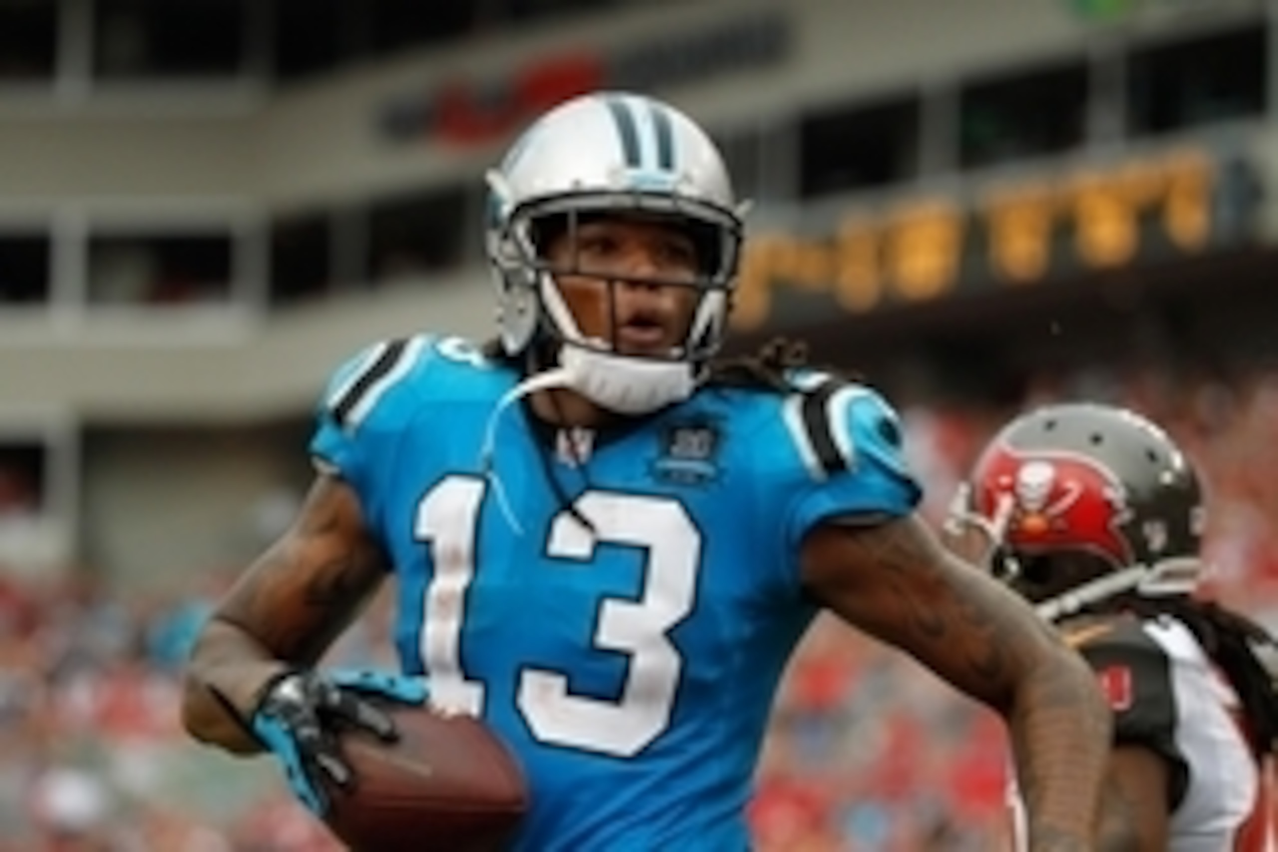 Sep 7, 2014; Tampa, FL, USA; Carolina Panthers wide receiver Kelvin Benjamin (13) reacts and smiles after he catches the ball for a touchdown against the Tampa Bay Buccaneers during the second half at Raymond James Stadium. Carolina Panthers defeated the 