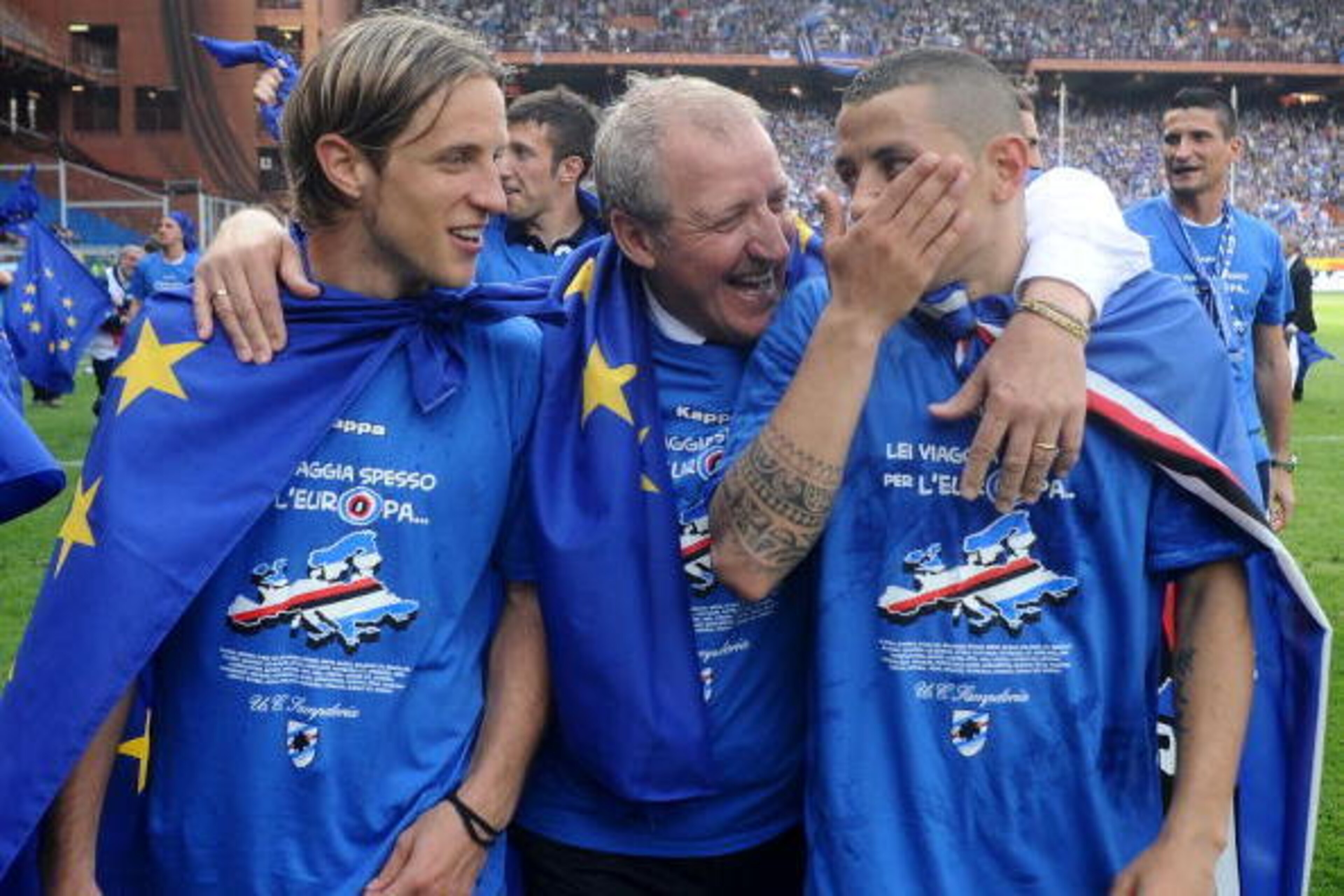 GENOA, ITALY - MAY 16: Reto Ziegler, head coach Luigi Del Neri and Angelo Palombo of UC Sampdoria celebrate fourth place and the Champions League qualification after the Serie A match between UC Sampdoria and SSC Napoli at Stadio Luigi Ferraris on May 16,