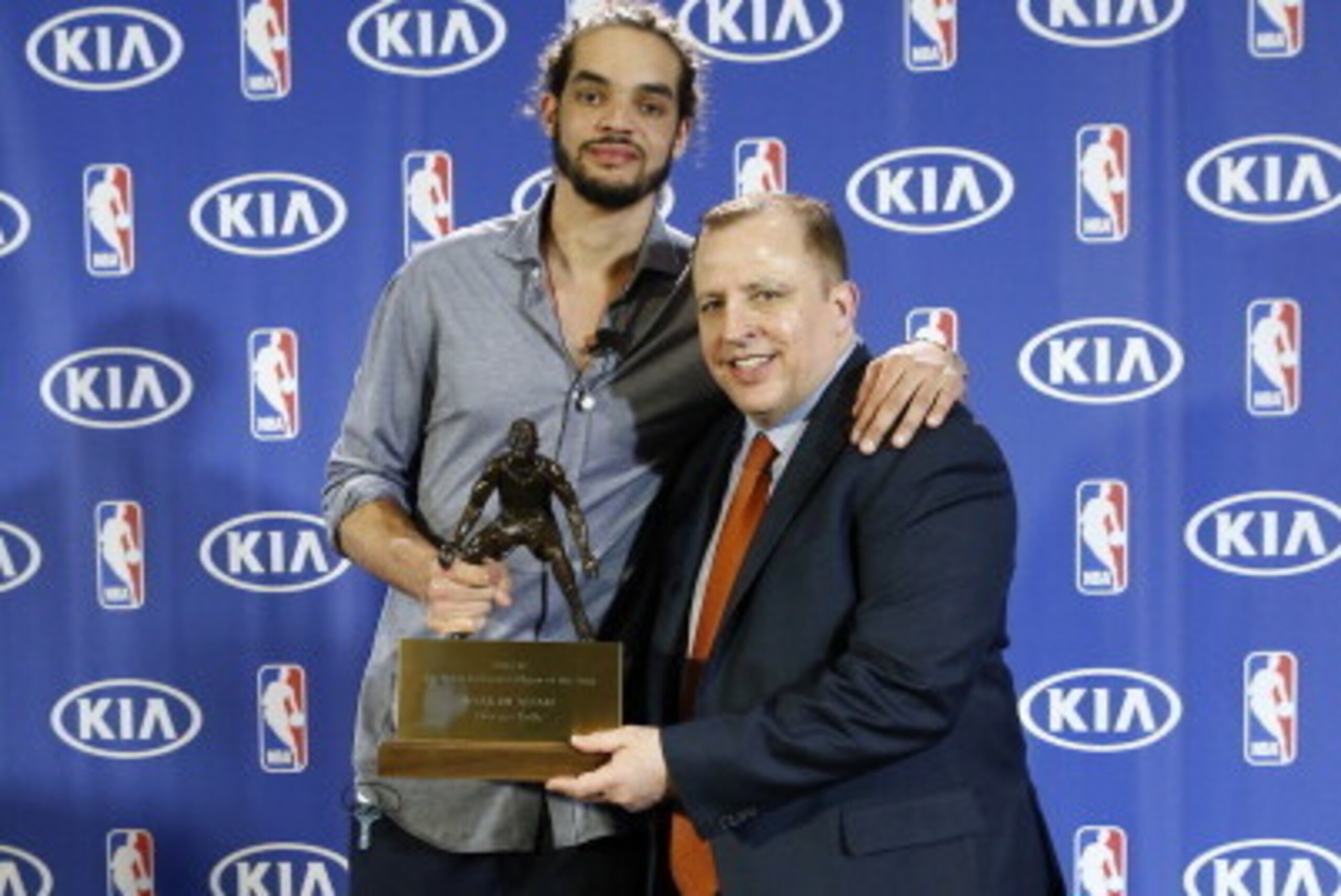 LINCOLNSHIRE, IL - APRIL 21: Joakim Noah, left, of the Chicago Bulls poses for a photo with Head Coach Tom Thibodeau, right, during a NBA press conference after receiving KIA NBA Defensive Player of the Year Award on April 21, 2014 at the Lincolnshire Mar