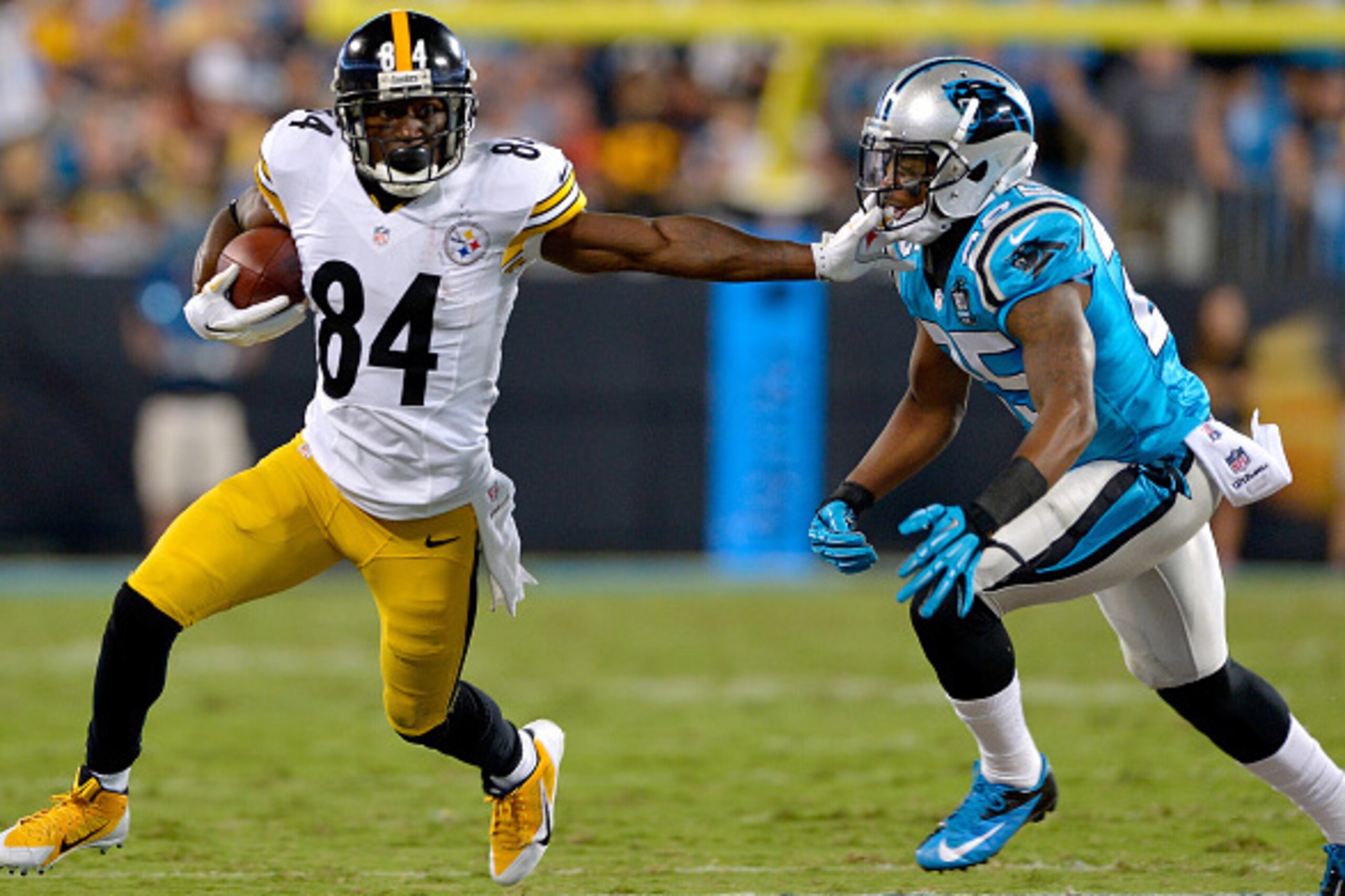CHARLOTTE, NC - SEPTEMBER 21: Antonio Brown #84 of the Pittsburgh Steelers runs against Bene Benwikere #25 of the Carolina Panthers in the 1st half during their game at Bank of America Stadium on September 21, 2014 in Charlotte, North Carolina. (Photo by CHARLOTTE, NC - SEPTEMBER 21: Antonio Brown #84 of the Pittsburgh Steelers runs against Bene Benwikere #25 of the Carolina Panthers in the 1st half during their game at Bank of America Stadium on September 21, 2014 in Charlotte, North Carolina. (Photo by