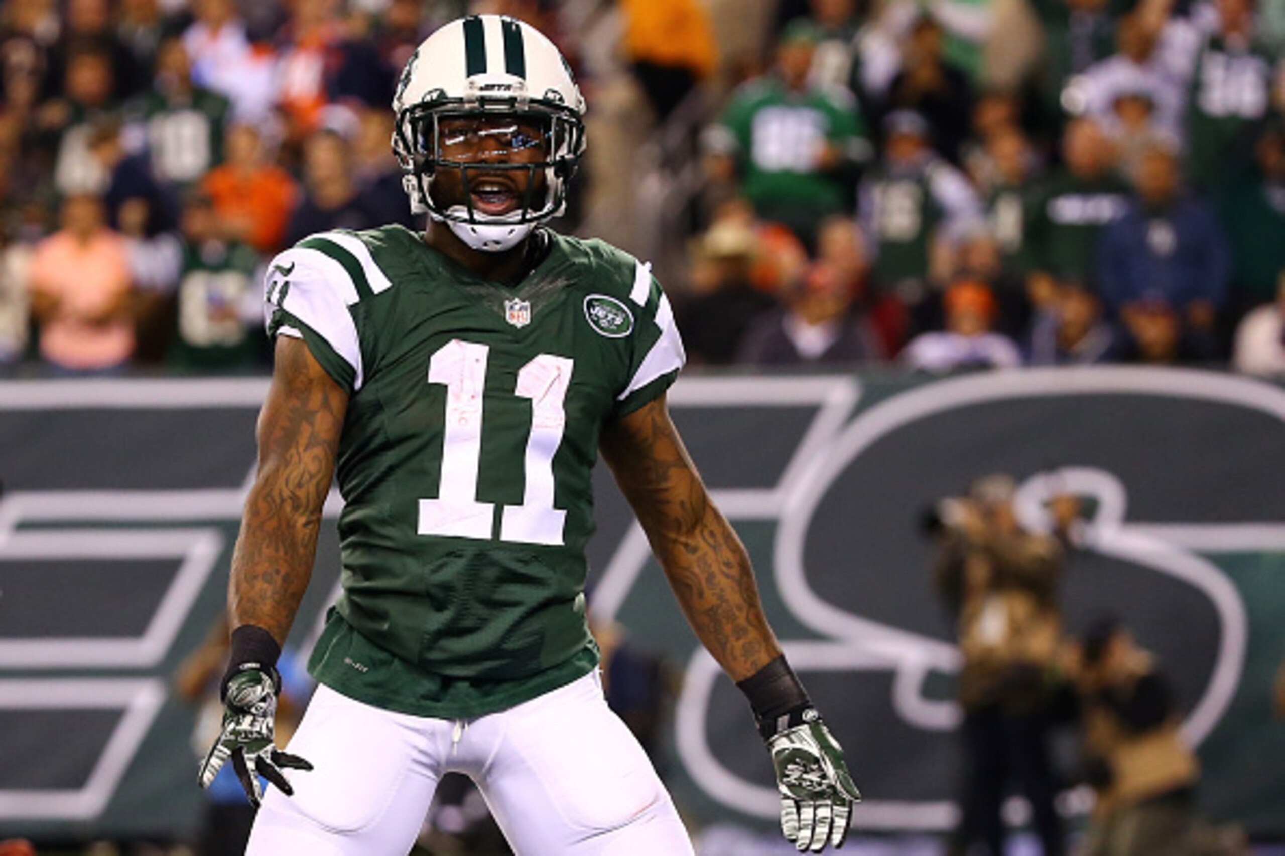 EAST RUTHERFORD, NJ - SEPTEMBER 22:  Wide receiver Jeremy Kerley #11 of the New York Jets celebrates a second quarter touchdown against the Chicago Bears during a game at MetLife Stadium on September 22, 2014 in East Rutherford, New Jersey.  (Photo by Al 