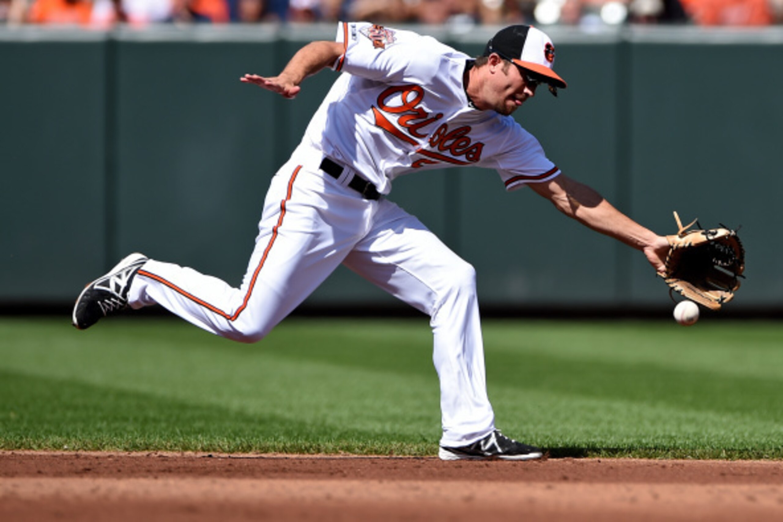 BALTIMORE, MD - SEPTEMBER 12: Shortstop J.J. Hardy #2 of the Baltimore Orioles cannot make a play on a hit by Jacoby Ellsbury #22 of the New York Yankees (not pictured) in the third inning during game one of a doubleheader at Oriole Park at Camden Yards o