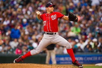 SEATTLE, WA - AUGUST 30:  Stephen Strasburg #37 of the Washington Nationals pitches during MLB baseball action against the Seattle Mariners at Safeco Field on August 30, 2014 in Seattle, Washington.  (Photo by Rich Lam/Getty Images)