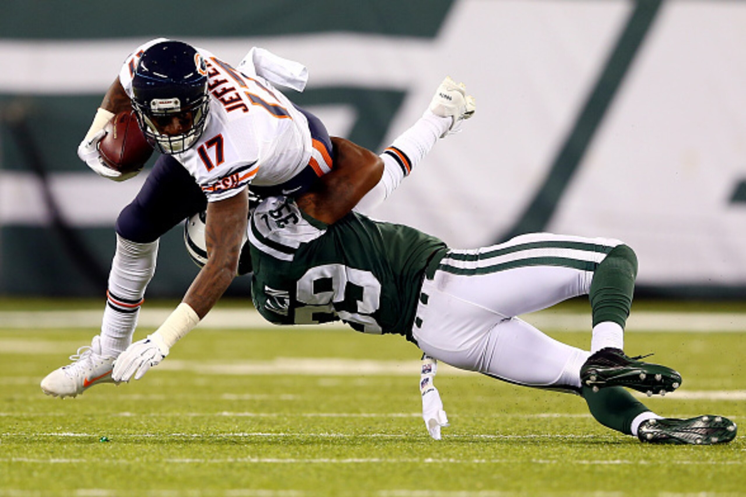 EAST RUTHERFORD, NJ - SEPTEMBER 22:  Wide receiver Alshon Jeffery #17 of the Chicago Bears is tackled by free safety Antonio Allen #39 of the New York Jets during a game at MetLife Stadium on September 22, 2014 in East Rutherford, New Jersey.  (Photo by E
