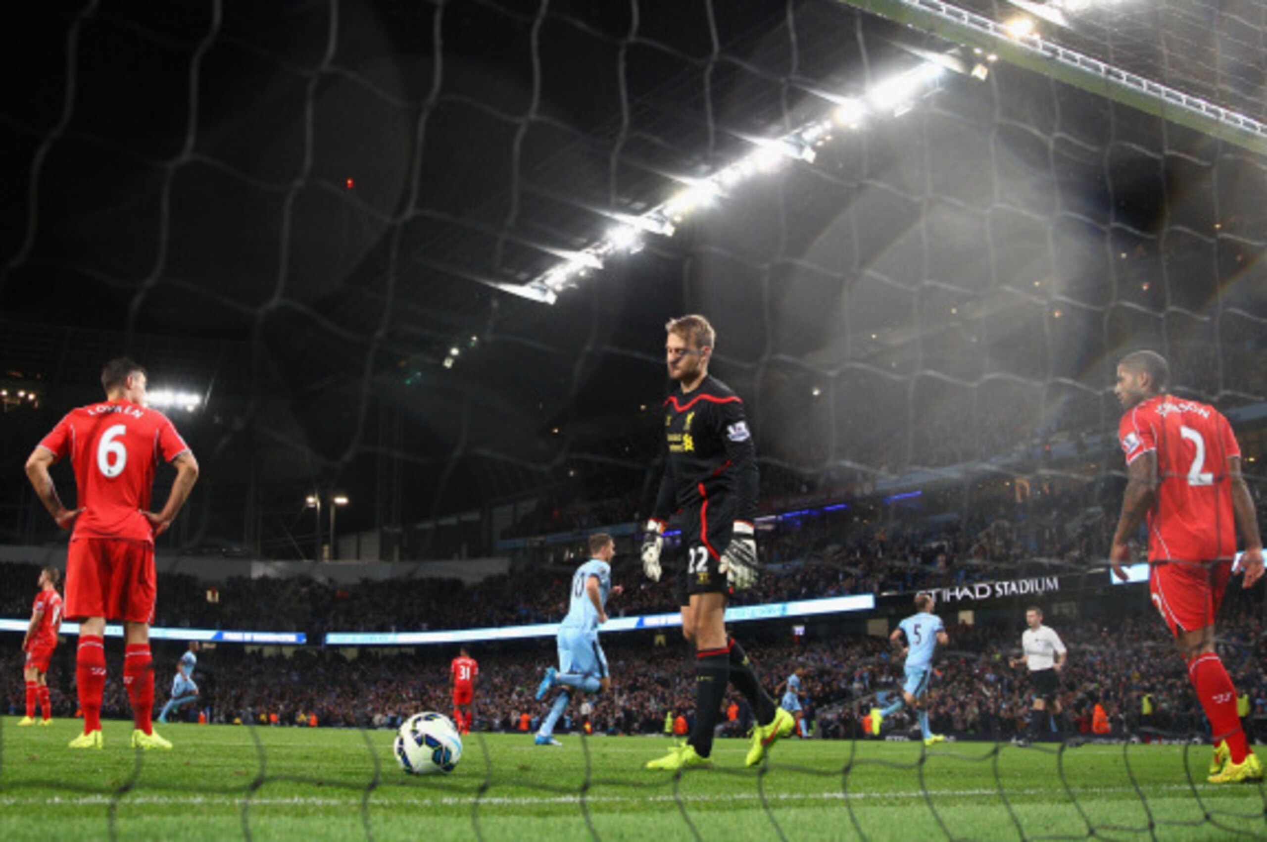 MANCHESTER, ENGLAND - AUGUST 25:   Simon Mignolet of Liverpool looks dejected after conceding the second goal during the Barclays Premier League match between Manchester City and Liverpool at the Etihad Stadium on August 25, 2014 in Manchester, England.  