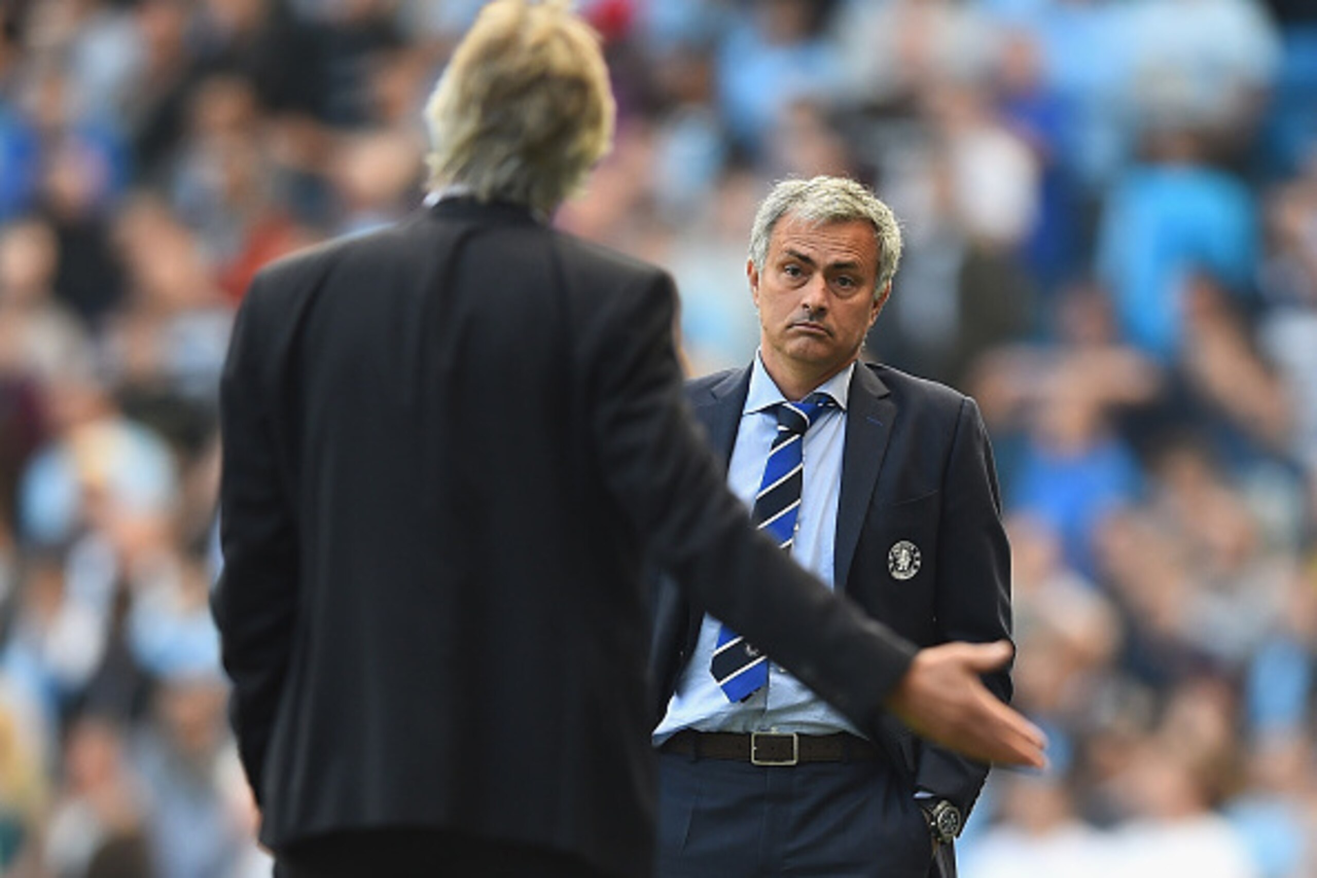 MANCHESTER, ENGLAND - SEPTEMBER 21: Jose Mourinho of Chelsea speaks with Manuel Pellegrini of Manchester City during the Barclays Premier League match between Manchester City and Chelsea at Etihad Stadium on September 21, 2014 in Manchester, England.  (Ph