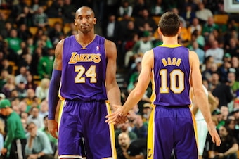 BOSTON, MA - FEBRUARY 7:  Kobe Bryant #24 and Steve Nash #10 of the Los Angeles Lakers high five during the game against the Boston Celtics on February 7, 2013 at the TD Garden in Boston, Massachusetts.  NOTE TO USER: User expressly acknowledges and agree