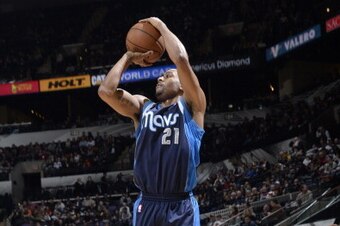 SAN ANTONIO, TX - January 8: Wayne Ellington #21 of the Dallas Mavericks shoots the ball against the San Antonio Spurs during the game at the AT&T Center on January 8, 2014 in San Antonio, Texas. NOTE TO USER: User expressly acknowledges and agrees that,
