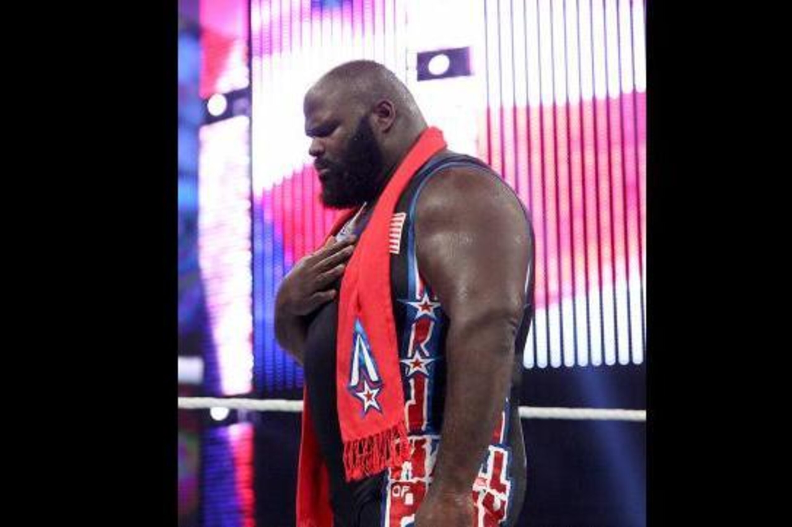 Mark Henry gets emotional during the national anthem.