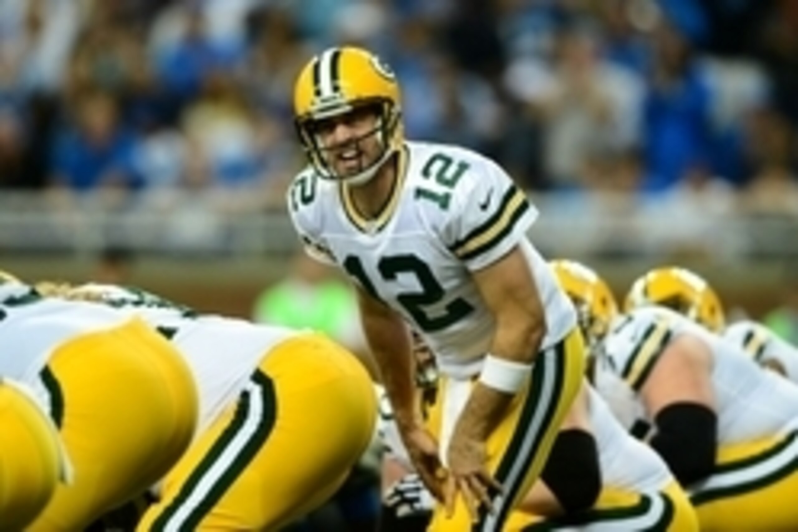 Sep 21, 2014; Detroit, MI, USA; Green Bay Packers quarterback Aaron Rodgers (12) gestures at the line of scrimmage during the second quarter against the Detroit Lions at Ford Field. Mandatory Credit: Andrew Weber-USA TODAY Sports