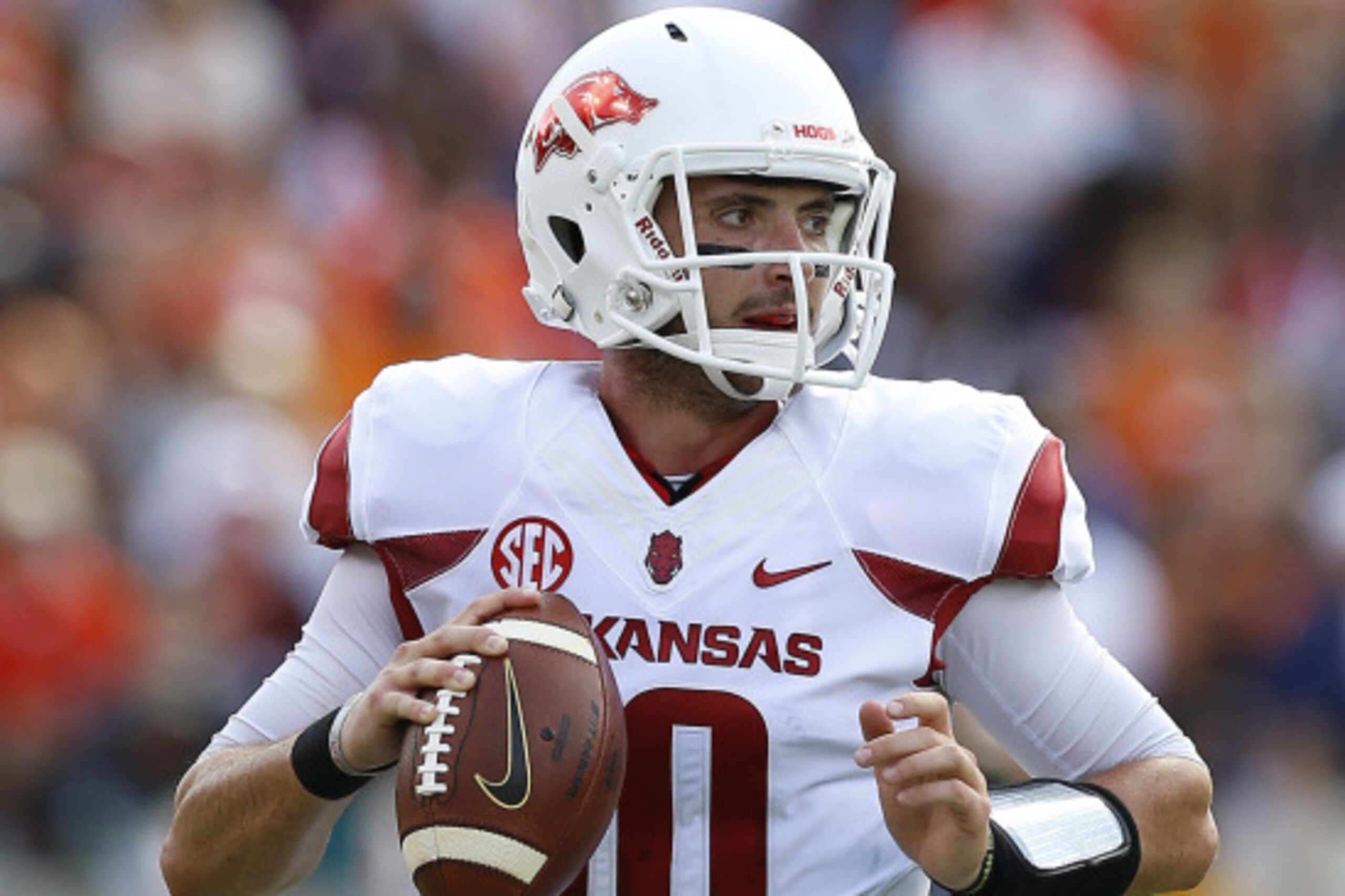 AUBURN, AL - AUGUST 30:  Quarterback Brandon Allen #10 of the Arkansas Razorbacks drops back to pass during the game against the Auburn Tigers at Jordan Hare Stadium on August 30, 2014 in Auburn, Alabama.  (Photo by Mike Zarrilli/Getty Images)