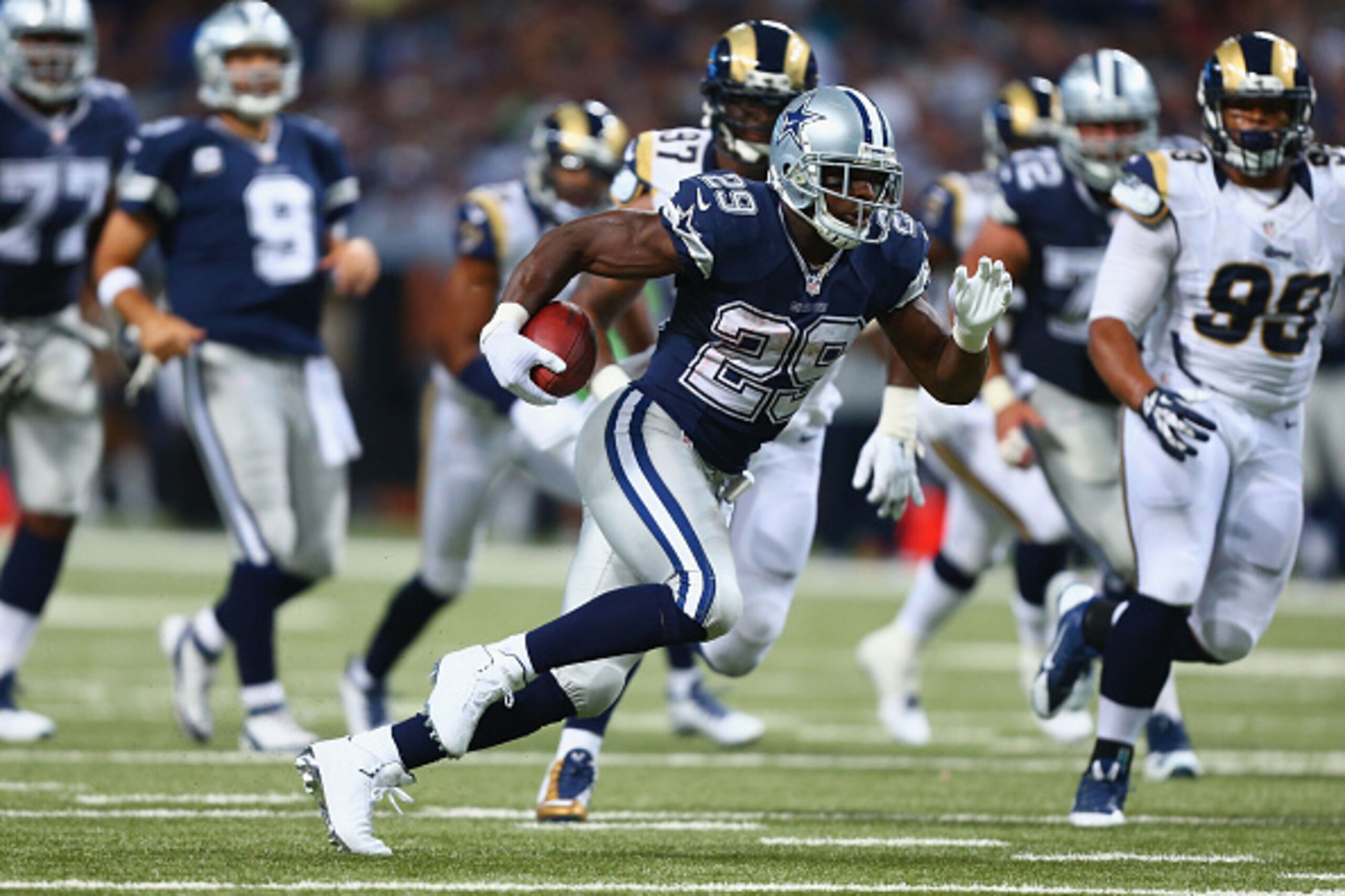 ST. LOUIS, MO - SEPTEMBER 21: DeMarco Murray #29 of the Dallas Cowboys rushes against the St. Louis Rams in the first quarter at the Edward Jones Dome on September 21, 2014 in St. Louis, Missouri.  The Cowboys beat the Rams 34-31.  (Photo by Dilip Vishwan