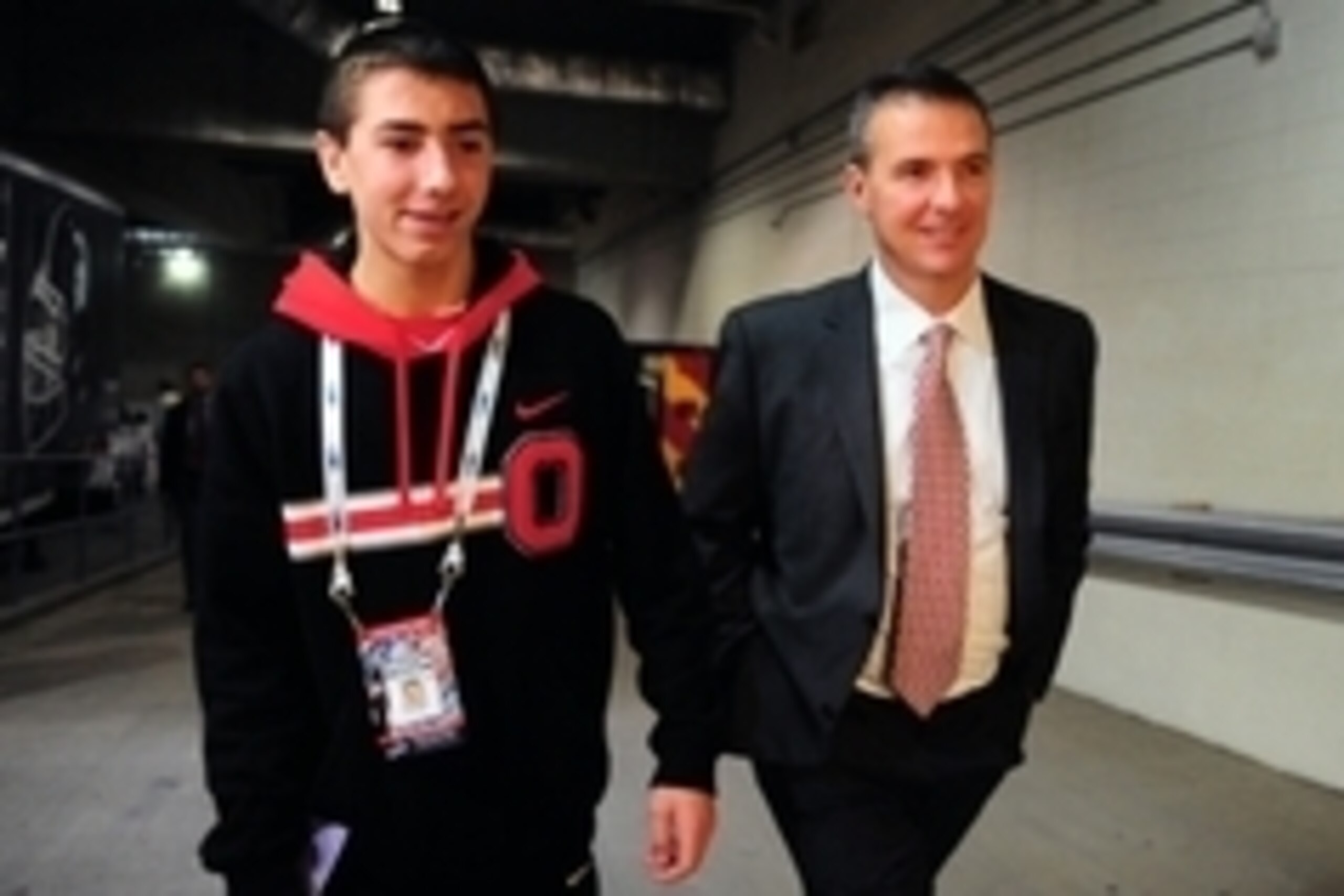 Dec 7, 2013; Indianapolis, IN, USA; Ohio State Buckeyes head coach Urban Meyer and son Nate Meyer arrive at the stadium prior to the 2013 Big 10 Championship game against the Michigan State Spartans at Lucas Oil Stadium. Mandatory Credit: Andrew Weber-USA Dec 7, 2013; Indianapolis, IN, USA; Ohio State Buckeyes head coach Urban Meyer and son Nate Meyer arrive at the stadium prior to the 2013 Big 10 Championship game against the Michigan State Spartans at Lucas Oil Stadium. Mandatory Credit: Andrew Weber-USA