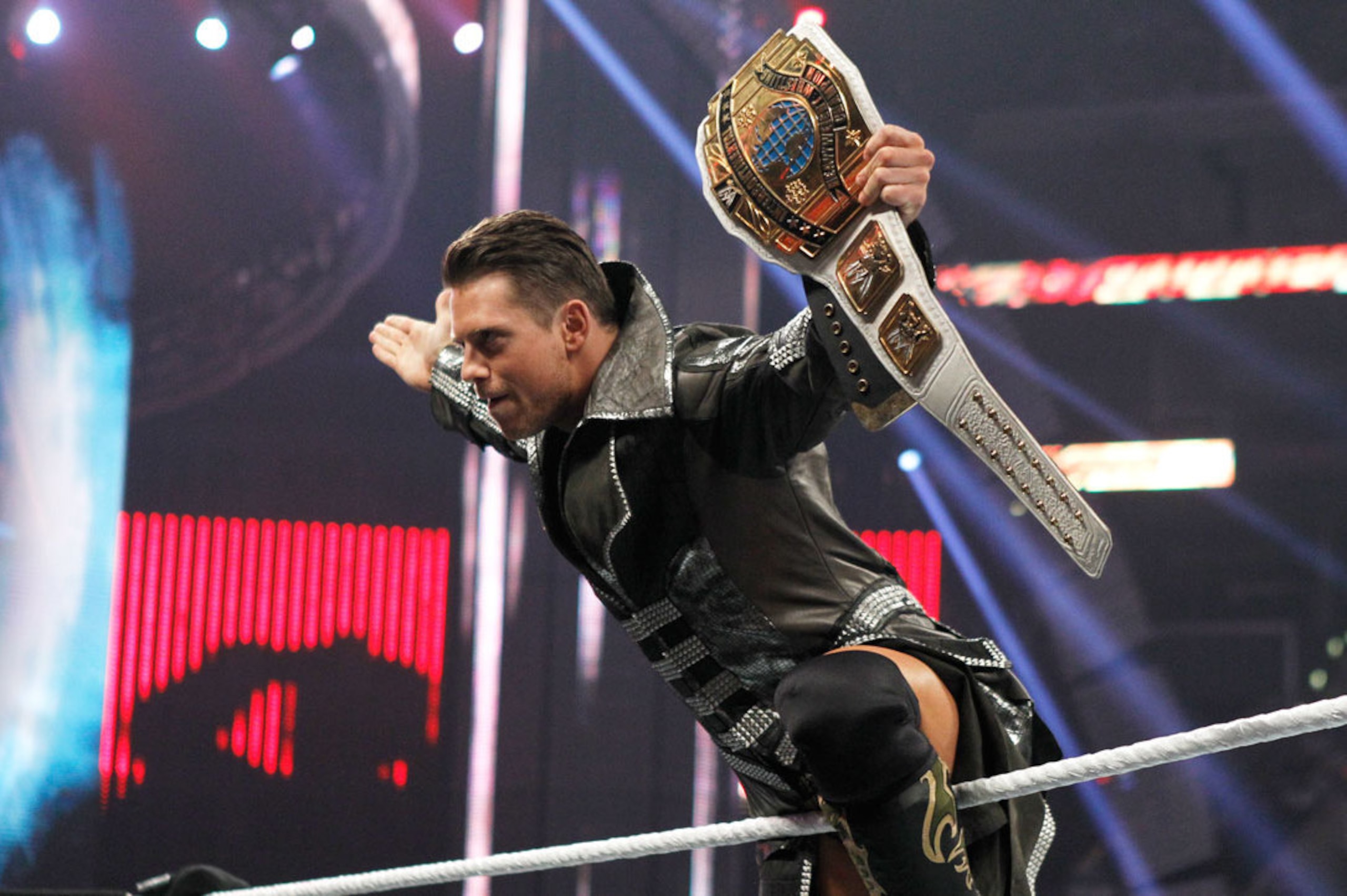 The Miz holds up the Intercontinental Championship.
