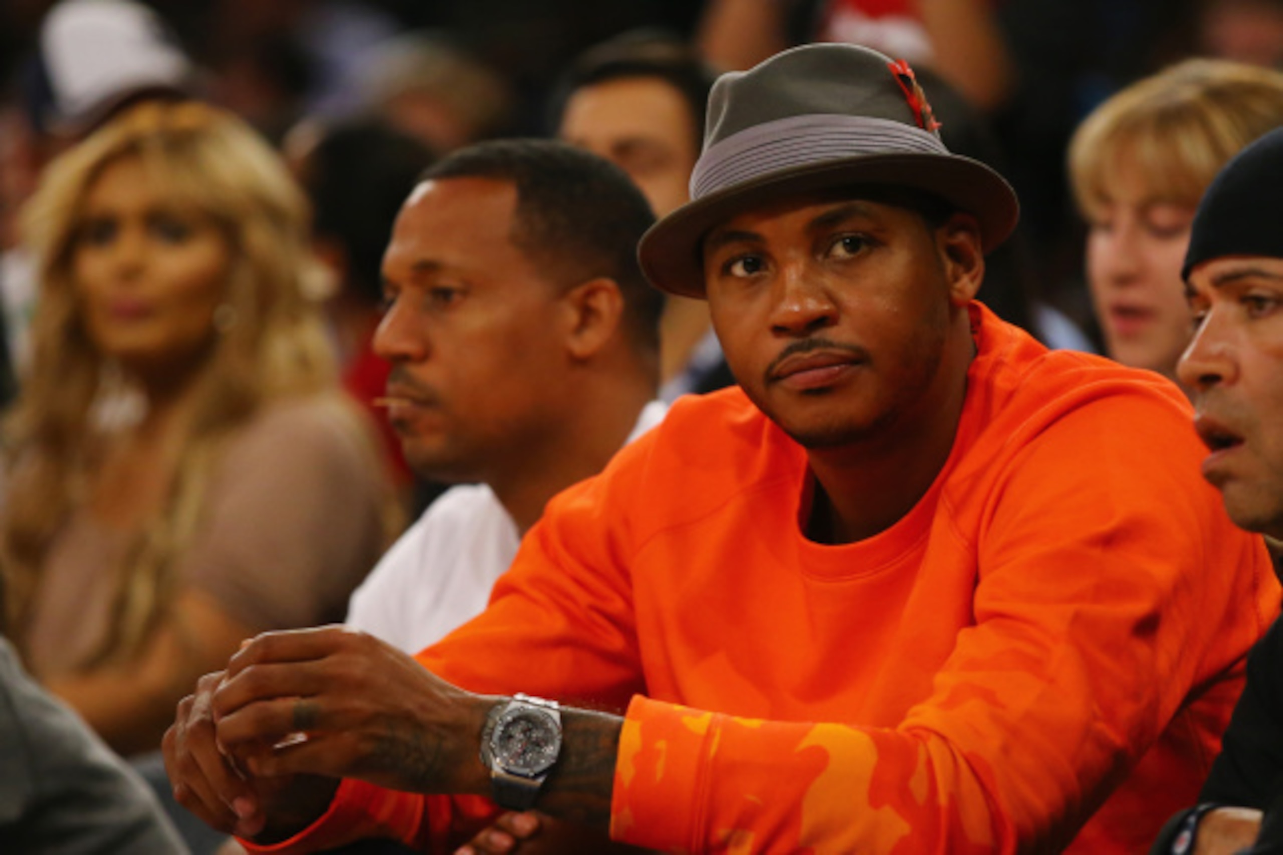 NEW YORK, NY - AUGUST 22:  Carmelo Anthony watches the USA aginst Puerto Rico game at Madison Square Garden on August 22, 2014 in New York City.  (Photo by Al Bello/Getty Images)