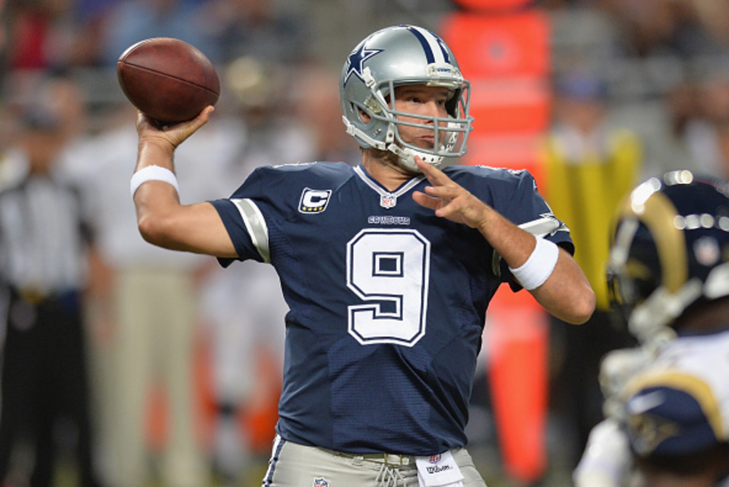 ST. LOUIS, MO - SEPTEMBER 21:  Tony Romo #9 of the Dallas Cowboys passes against the St. Louis Rams in the first quarter at the Edward Jones Dome on September 21, 2014 in St. Louis, Missouri.  (Photo by Michael B. Thomas/Getty Images)
