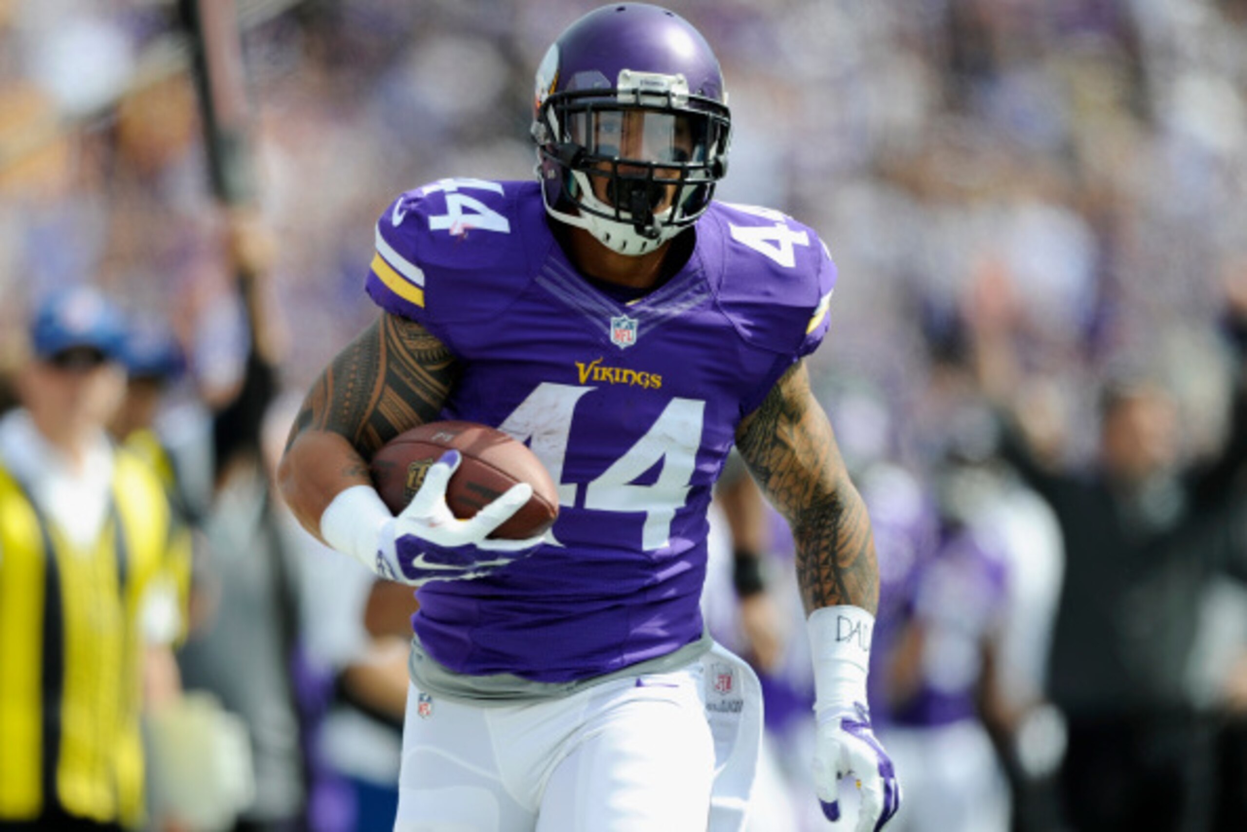 MINNEAPOLIS, MN - SEPTEMBER 14: Matt Asiata #44 of the Minnesota Vikings carries the ball during the first quarter of the game against the New England Patriots on September 14, 2014 at TCF Bank Stadium in Minneapolis, Minnesota. Asiata scored a touchdown 