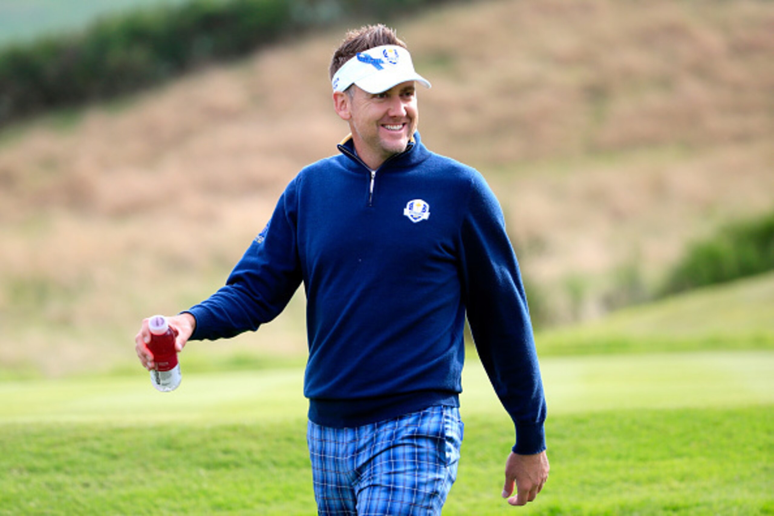 AUCHTERARDER, SCOTLAND - SEPTEMBER 23:  Ian Poulter of Europe smiles during practice ahead of the 2014 Ryder Cup on the PGA Centenary course at the Gleneagles Hotel on September 23, 2014 in Auchterarder, Scotland.  (Photo by Harry How/Getty Images)