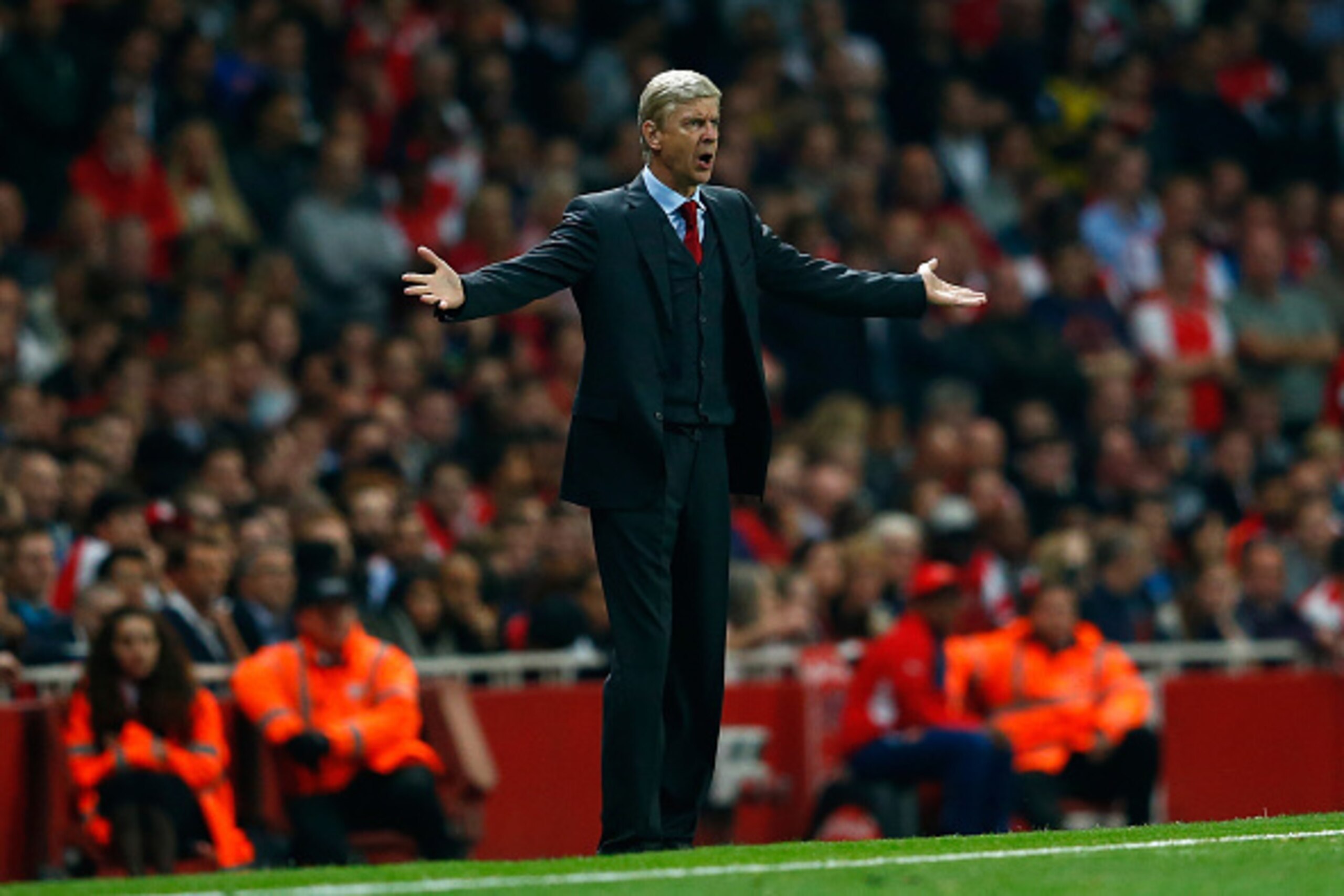 LONDON, ENGLAND - SEPTEMBER 23:  Manager of Arsenal, Arsene Wenger reacts during the Capital One Cup Third Round match between Arsenal and Southampton at the Emirates Stadium on September 23, 2014 in London, England.  (Photo by Julian Finney/Getty Images)