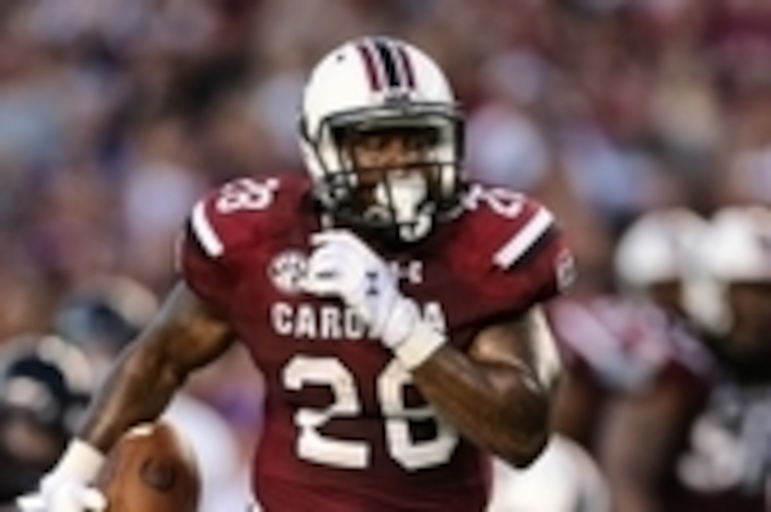 Sep 6, 2014; Columbia, SC, USA;  South Carolina Gamecocks running back Mike Davis (28) runs for his first touchdown of the evening during  game action between the South Carolina Gamecocks and East Carolina Pirates at Williams-Brice Stadium. Mandatory Cred