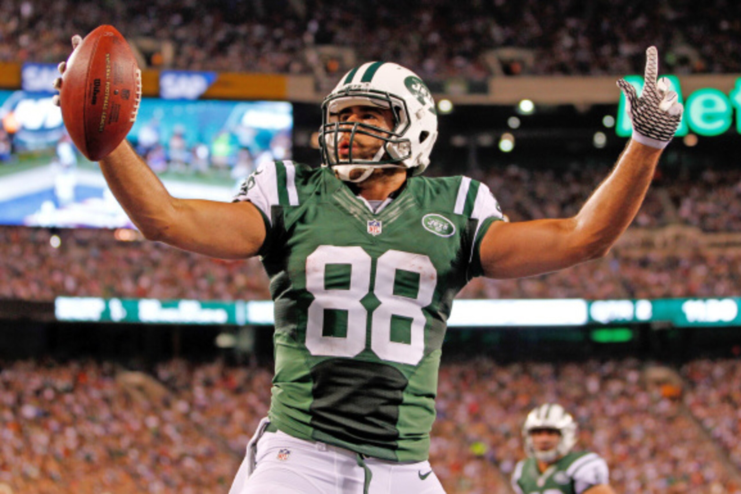 EAST RUTHERFORD, NJ - AUGUST 22:  Tight end Jace Amaro #88 of the New York Jets celebrates a touchdown reception in the second quarter of a preseason game against the New York Giants at MetLife Stadium on August 22, 2014 in East Rutherford, New Jersey.  (