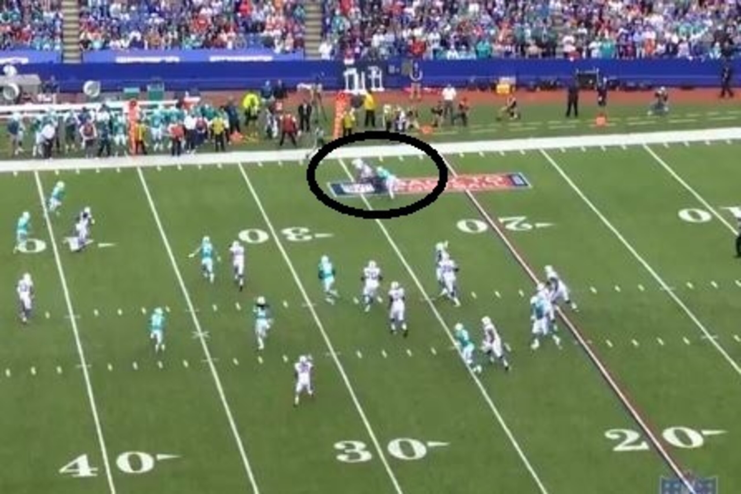 Jenkins tackling Fred Jackson for a loss on a screen pass