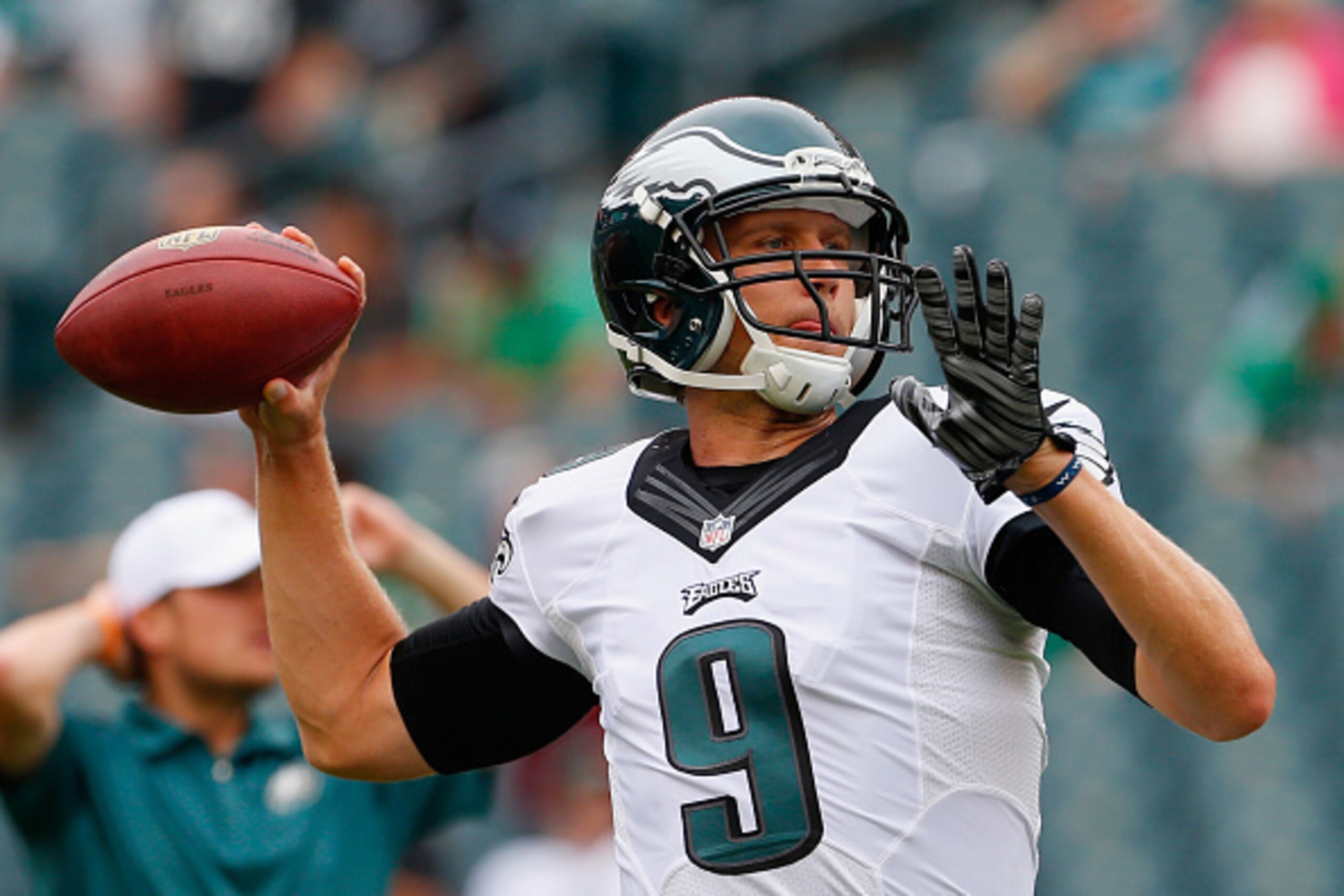 PHILADELPHIA, PA - SEPTEMBER 21:  Quarterback  Nick Foles #9 of the Philadelphia Eagles looks to pass during warm-ups before playing against the Washington Redskins at Lincoln Financial Field on September 21, 2014 in Philadelphia, Pennsylvania.  (Photo by