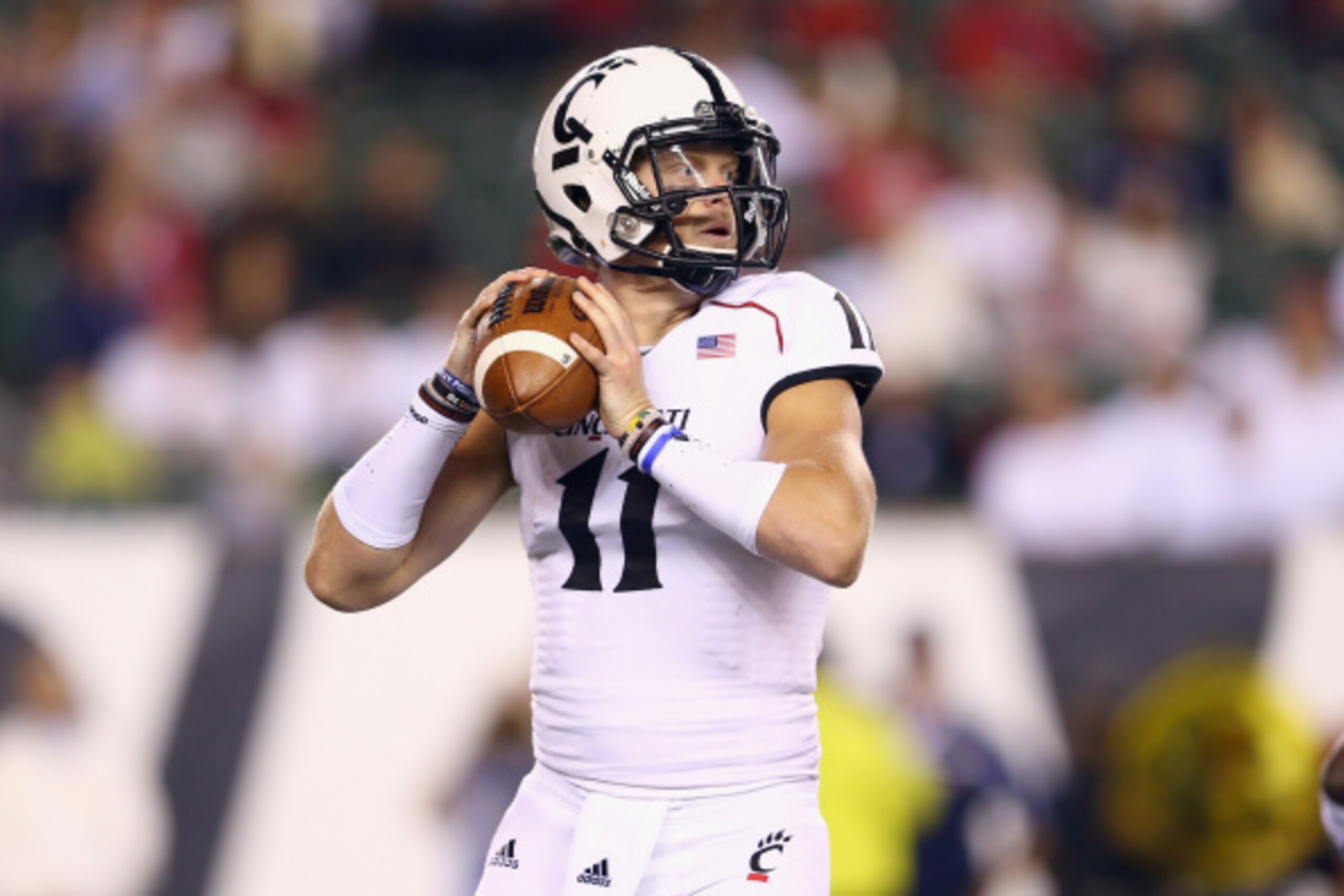 CINCINNATI, OH - SEPTEMBER 12:  Gunner Kiel #11 of the Cincinnati Bearcats throws a pass during the game against the Toledo Rockets at Paul Brown Stadium on September 12, 2014 in Cincinnati, Ohio.  (Photo by Andy Lyons/Getty Images)