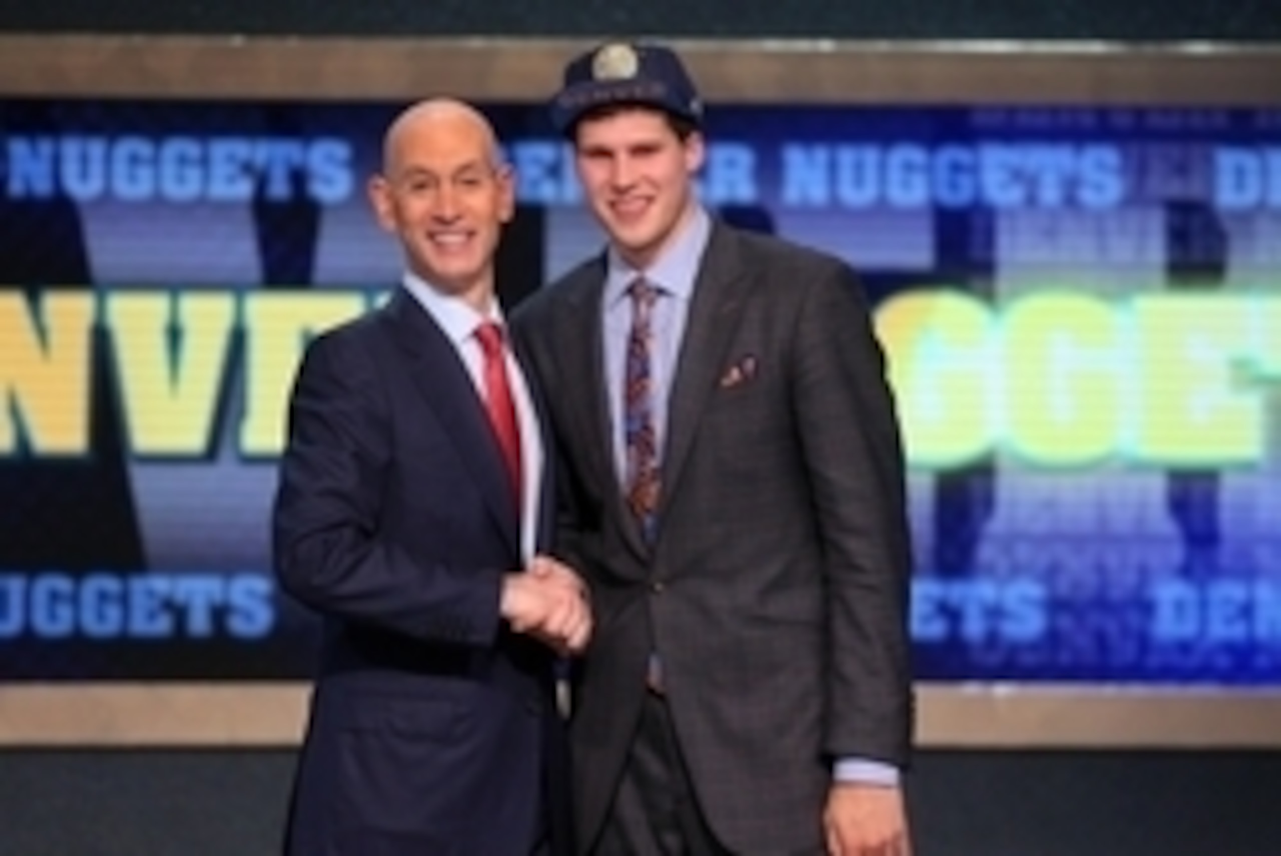 Jun 26, 2014; Brooklyn, NY, USA; Doug McDermott (Creighton) shakes hands with NBA commissioner Adam Silver after being selected as the number eleven overall pick to the Denver Nuggets in the 2014 NBA Draft at the Barclays Center. Mandatory Credit: Brad Pe Jun 26, 2014; Brooklyn, NY, USA; Doug McDermott (Creighton) shakes hands with NBA commissioner Adam Silver after being selected as the number eleven overall pick to the Denver Nuggets in the 2014 NBA Draft at the Barclays Center. Mandatory Credit: Brad Pe