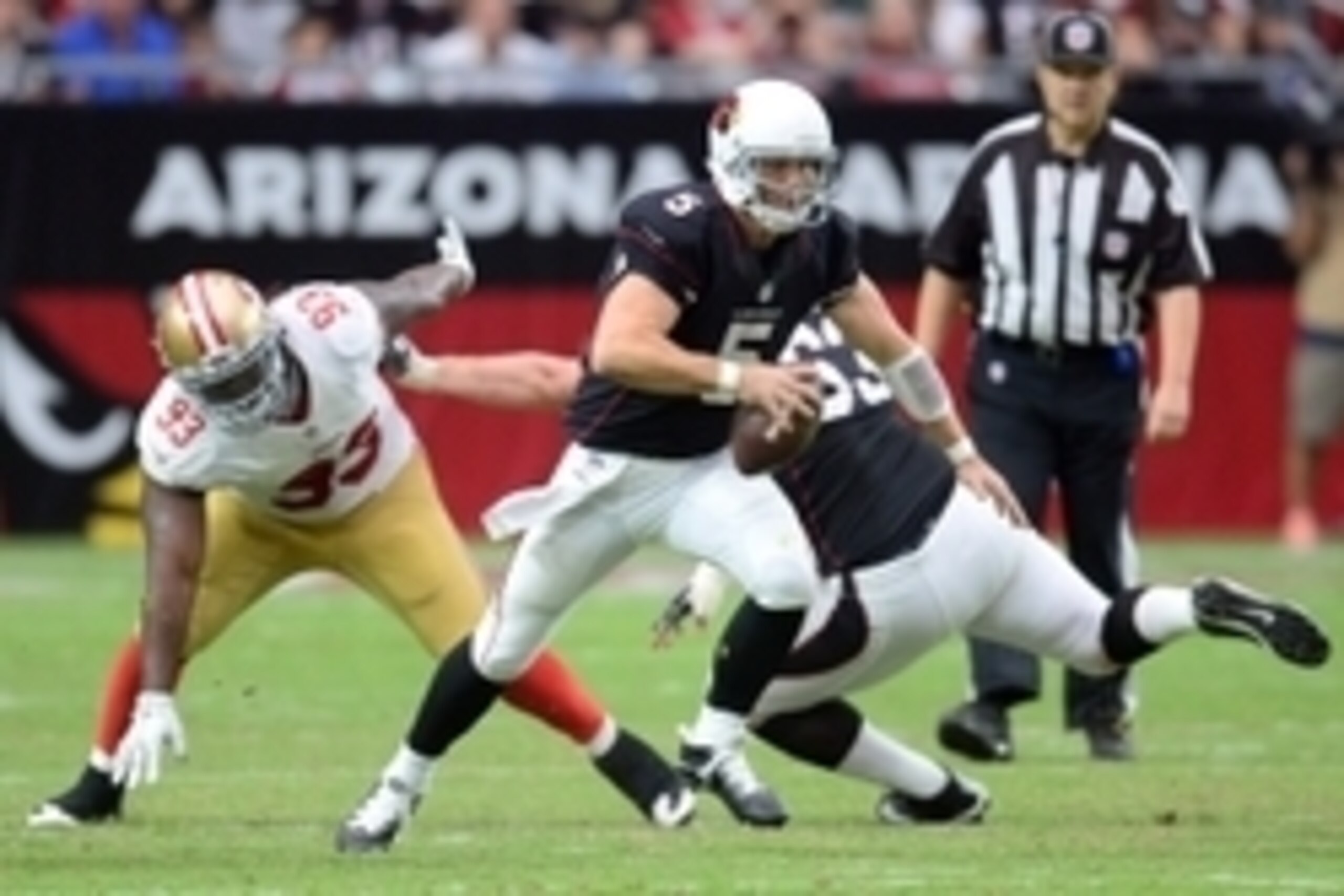 Sep 21, 2014; Glendale, AZ, USA; Arizona Cardinals quarterback Drew Stanton (5) runs with the ball against the San Francisco 49ers during the second half at University of Phoenix Stadium. The Cardinals won 23-14. Mandatory Credit: Joe Camporeale-USA TODAY