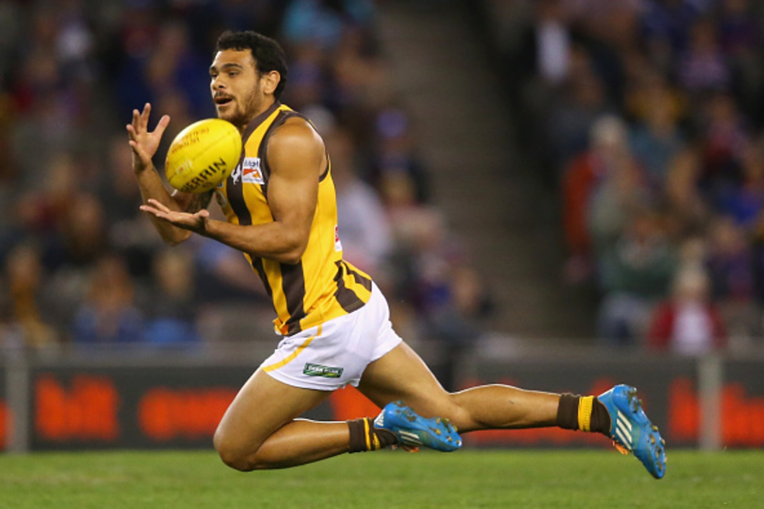 MELBOURNE, AUSTRALIA - SEPTEMBER 21:  Cyril Rioli of Box Hill  marks during the VFL Grand Final match between Footscray and Box Hill at Etihad Stadium on September 21, 2014 in Melbourne, Australia.  (Photo by Quinn Rooney/Getty Images)