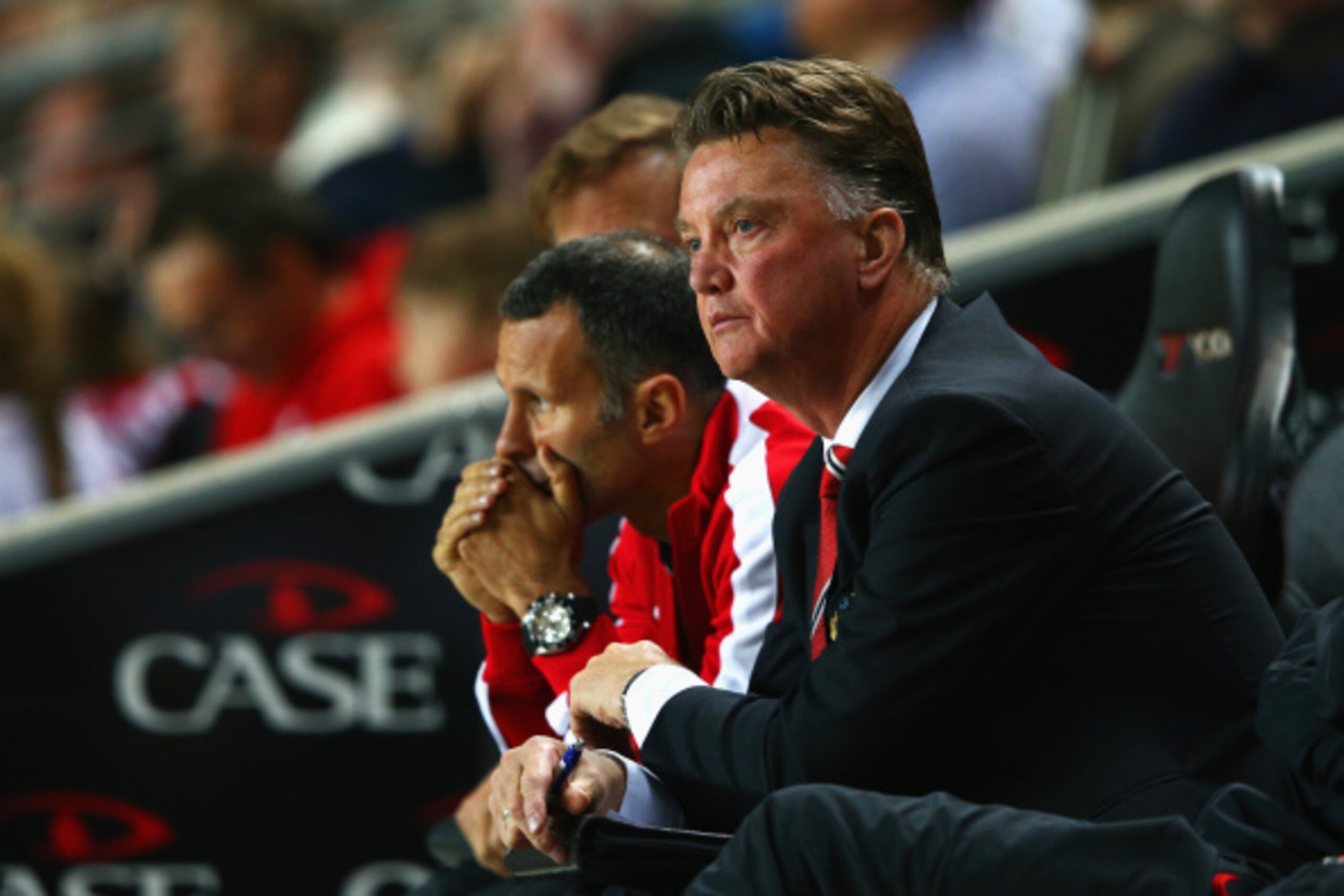 MILTON KEYNES, ENGLAND - AUGUST 26:  Manager Louis van Gaal of Manchester United looks dejected with assistant Ryan Giggs during the Capital One Cup Second Round match between MK Dons and Manchester United at Stadium mk on August 26, 2014 in Milton Keynes