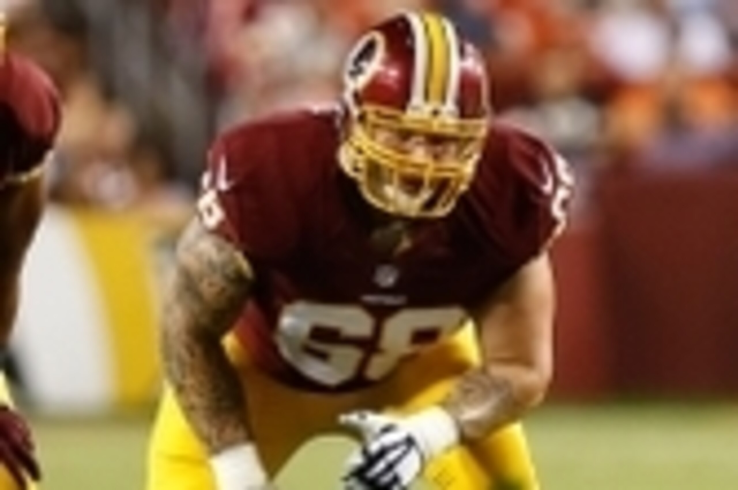 Aug 18, 2014; Landover, MD, USA; Washington Redskins offensive tackle Tom Compton (68) lines up against the Cleveland Browns at FedEx Field. Mandatory Credit: Geoff Burke-USA TODAY Sports