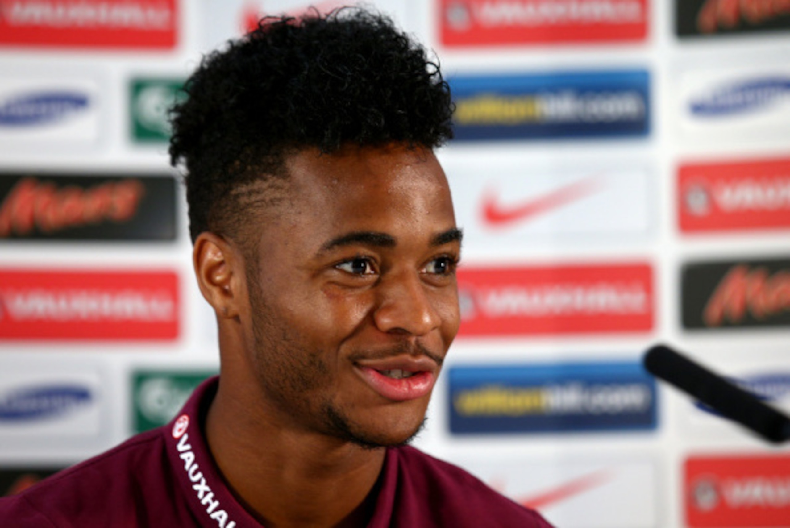 LONDON, ENGLAND - SEPTEMBER 01:  Raheem Sterling speaks to the press during a England Press Conference before the international friendly match against Norway at the Grove hotel on September 1, 2014 in London, England.  (Photo by Ian Walton/Getty Images)
