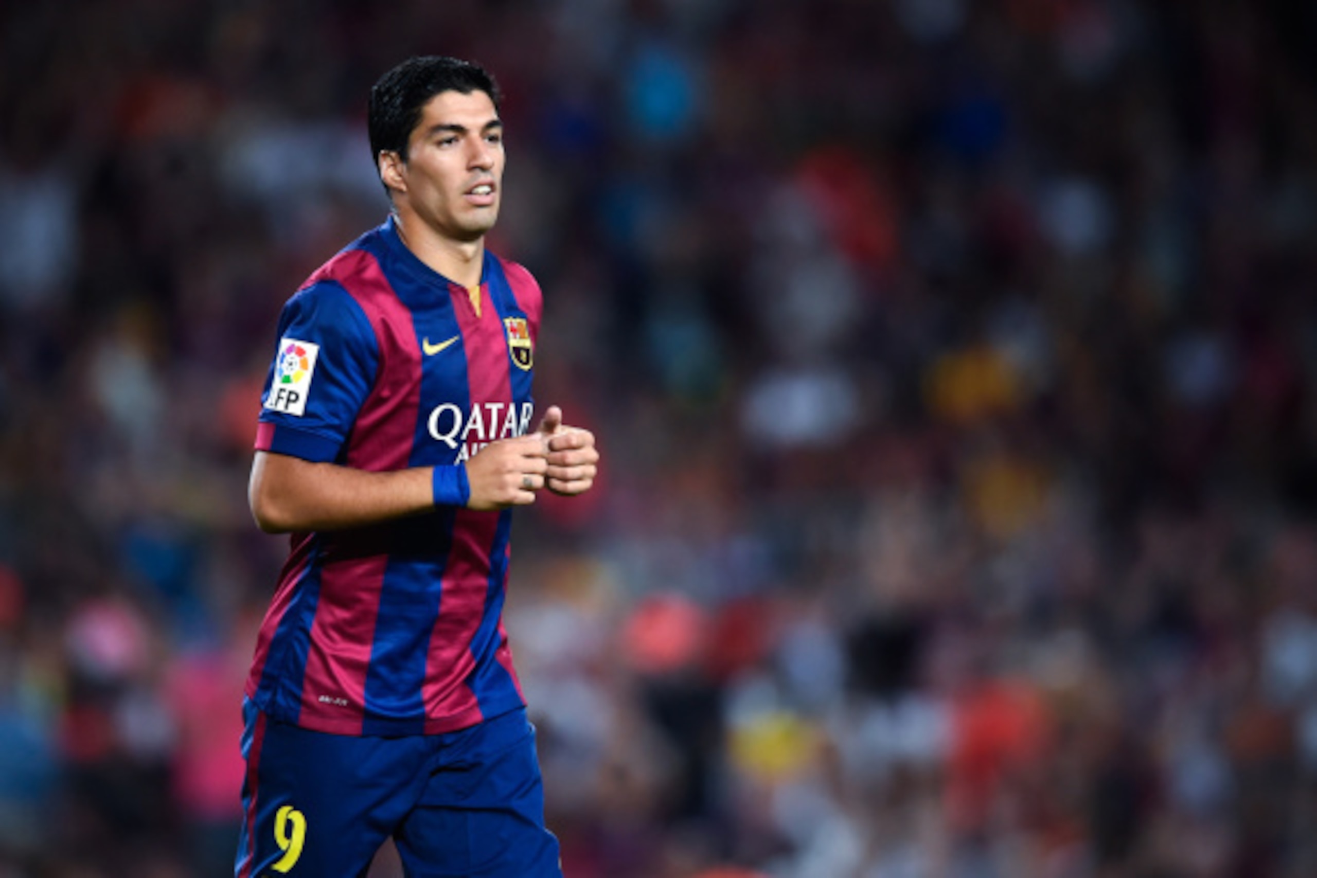 BARCELONA, SPAIN - AUGUST 18:  Luis Suarez of FC Barcelona looks on during the Joan Gamper Trophy match between FC Barcelona and Club Leon at Camp Nou on August 18, 2014 in Barcelona, Spain.  (Photo by David Ramos/Getty Images)