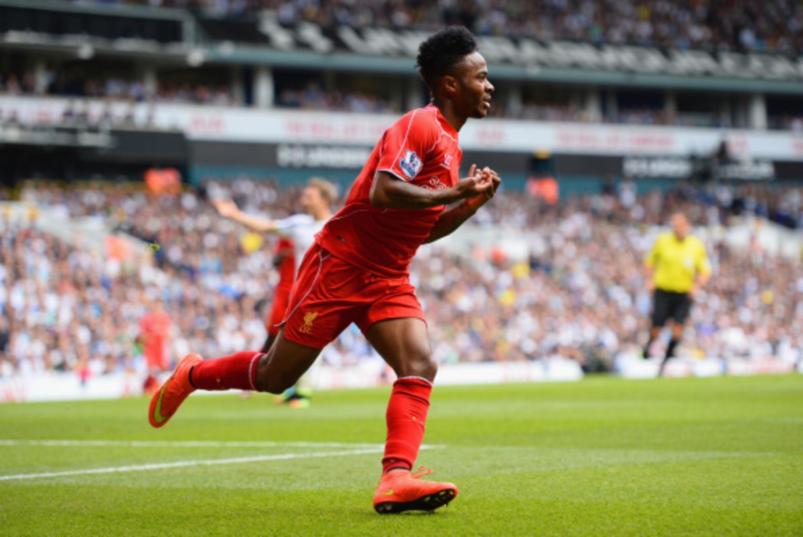 LONDON, ENGLAND - AUGUST 31:  Raheem Sterling of Liverpool celebrates scoring the opening goal during the Barclays Premier League match between Tottenham Hotspur and Liverpool at White Hart Lane on August 31, 2014 in London, England.  (Photo by Jamie McDo