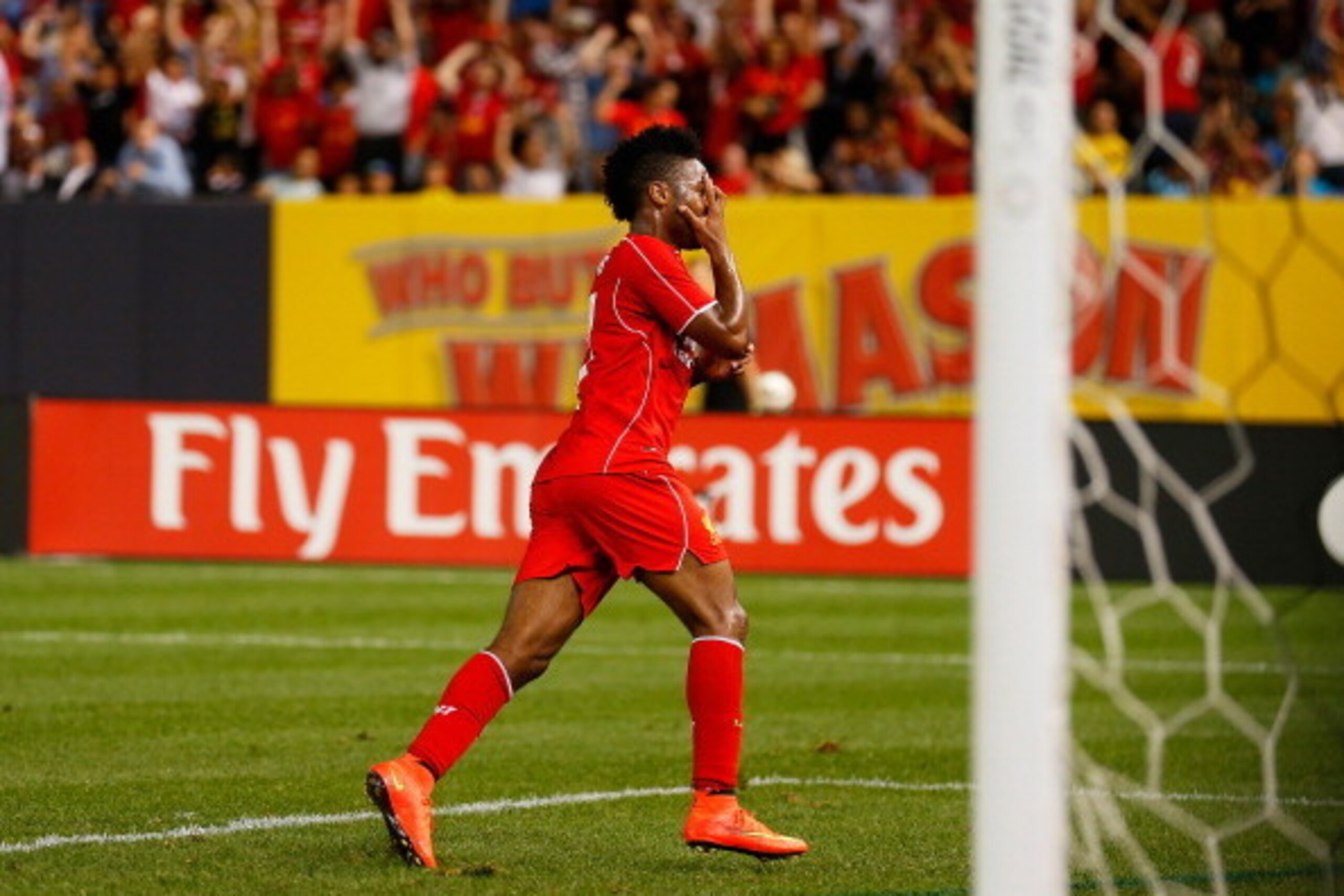 NEW YORK, NY - JULY 30:  Raheem Sterling #31 of Liverpool celebrates his goal in the 85th minute against Manchester City during the International Champions Cup 2014 at Yankee Stadium on July 30, 2014 in the Bronx borough of New York City.  (Photo by Mike 
