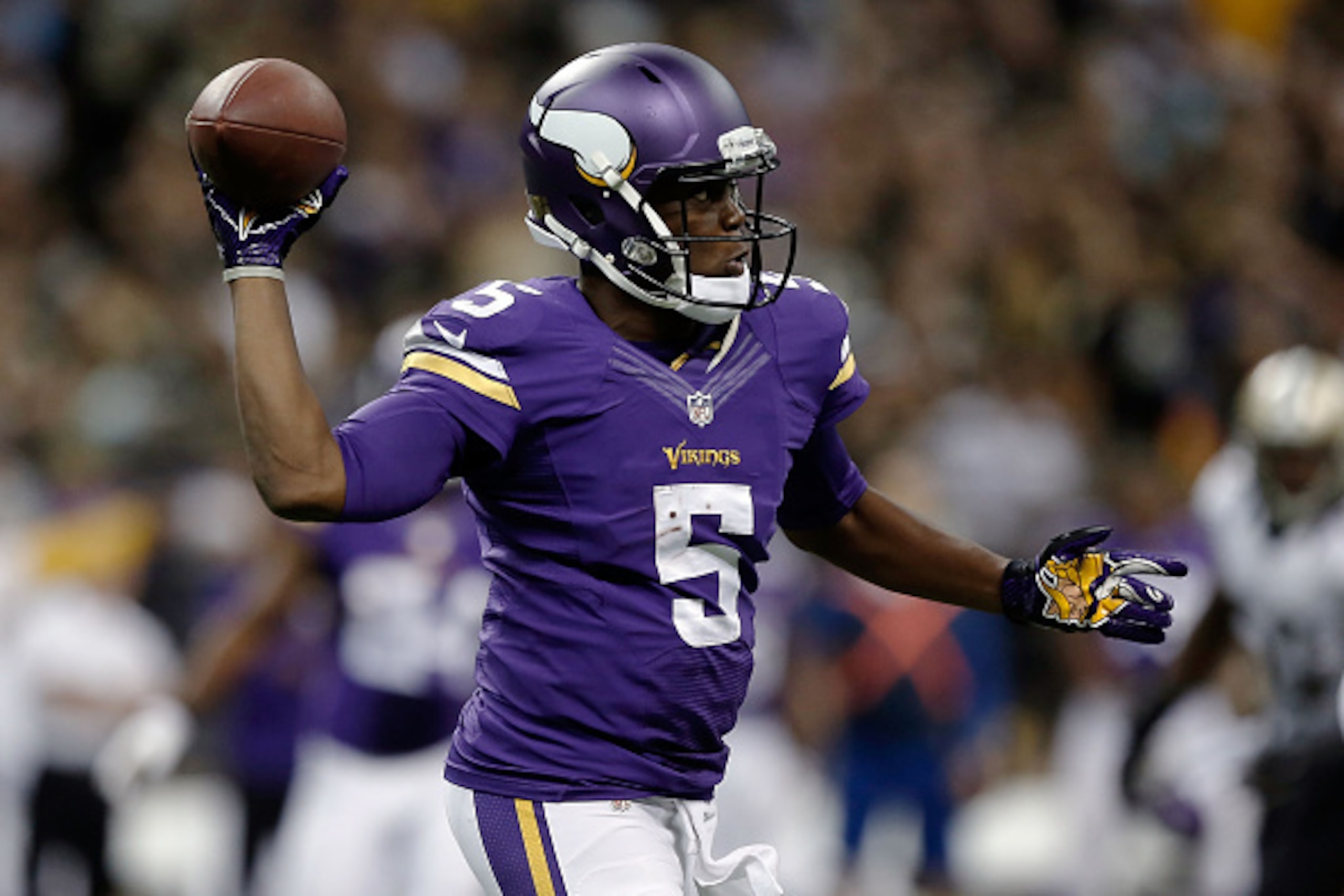 NEW ORLEANS, LA - SEPTEMBER 21:  Teddy Bridgewater #5 of the Minnesota Vikings throws a pass against the New Orleans Saints during the third quarter of a game at the Mercedes-Benz Superdome on September 21, 2014 in New Orleans, Louisiana.  (Photo by Sean 