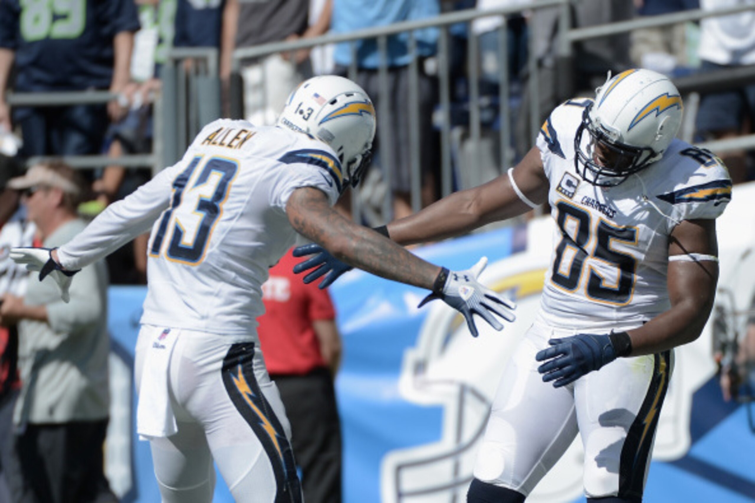 SAN DIEGO, CA - SEPTEMBER 14: Tight end Antonio Gates #85 of the San Diego Chargers is congratulated by teammate tight end John Phillips #83 after scoring a touchdown against the Seattle Seahawks at Qualcomm Stadium on September 14, 2014 in San Diego, Ca SAN DIEGO, CA - SEPTEMBER 14: Tight end Antonio Gates #85 of the San Diego Chargers is congratulated by teammate tight end John Phillips #83 after scoring a touchdown against the Seattle Seahawks at Qualcomm Stadium on September 14, 2014 in San Diego, Ca