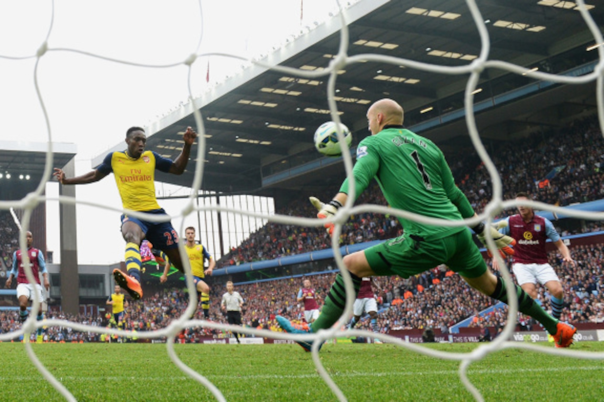 BIRMINGHAM, ENGLAND - SEPTEMBER 20:  Danny Welbeck of Arsenal scores his team's second goal during the Barclays Premier League match between Aston Villa and Arsenal at Villa Park on September 20, 2014 in Birmingham, England.  (Photo by Laurence Griffiths/
