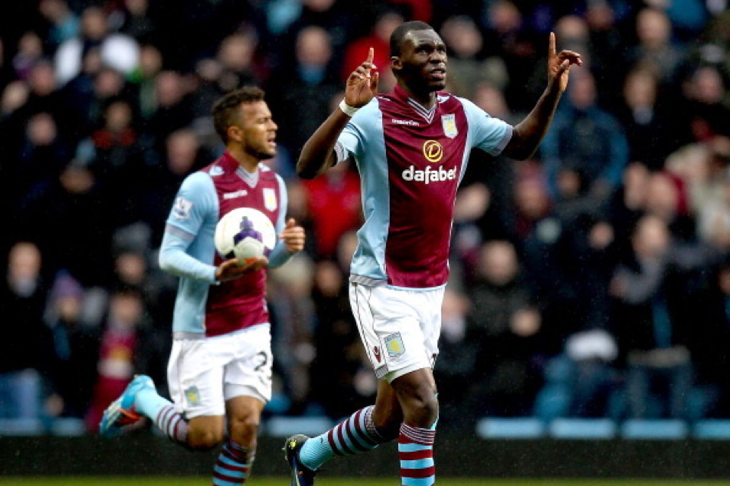 BIRMINGHAM, ENGLAND - MARCH 02: Christian Benteke of Aston villa celebrates after scoring his team's first goal of the game during the Barclays Premier League match between Aston Villa and Norwich City at Villa Park on March 2, 2014 in Birmingham, England