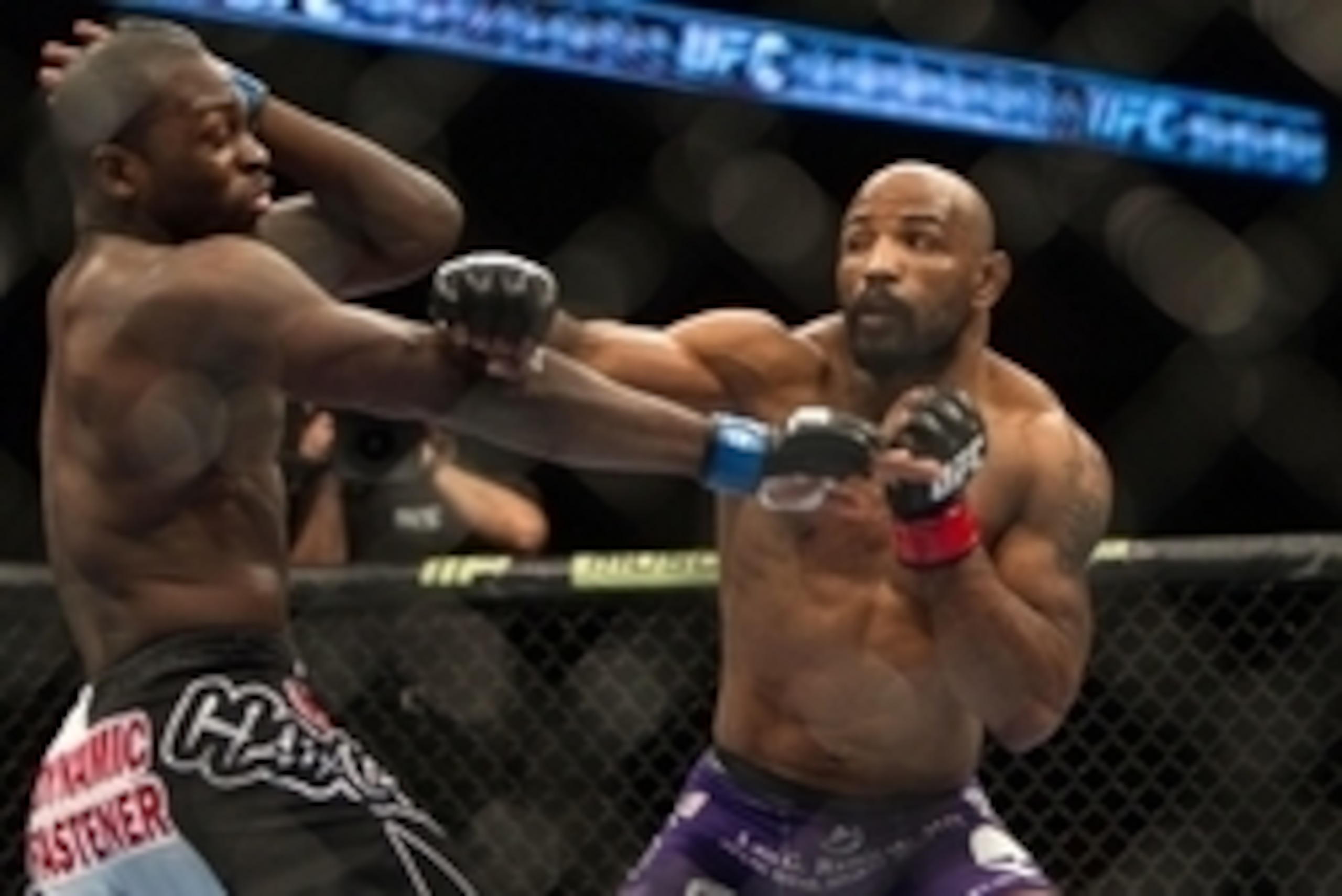 Jan 15, 2014; Duluth, GA, USA; Yoel Romero (red gloves) fights Derek Brunson during UFC Fight Night at Gwinnett Center. Mandatory Credit: Joshua S. Kelly-USA TODAY Sports