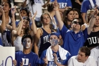 Aug 30, 2014; Durham, NC, USA; Duke Blue Devils fans cheer on their team against the Elon Phoenix at Wallace Wade Stadium. Mandatory Credit: Mark Dolejs-USA TODAY Sports