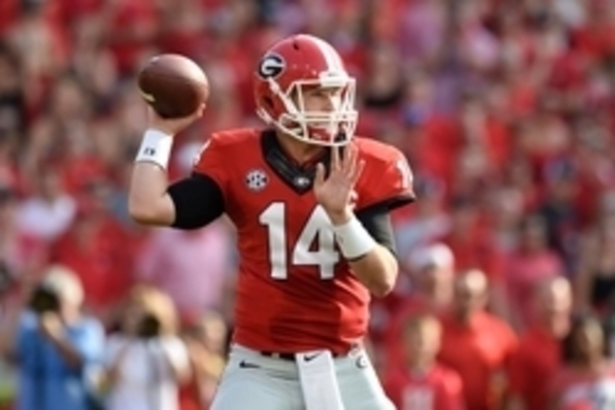 Aug 30, 2014; Athens, GA, USA; Georgia Bulldogs quarterback Hutson Mason (14) passes against the Clemson Tigers during the first quarter at Sanford Stadium. Mandatory Credit: Dale Zanine-USA TODAY Sports